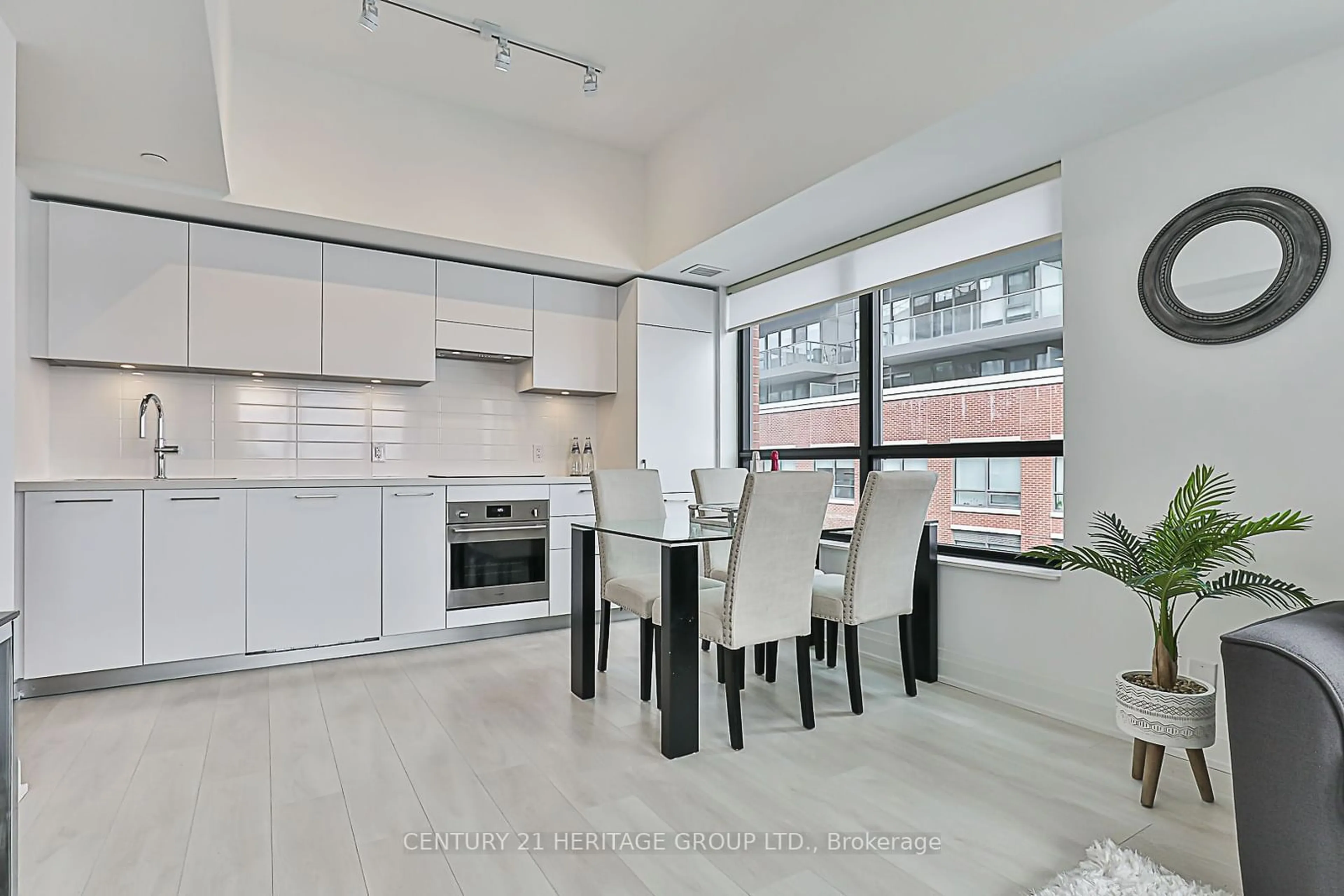 Open concept kitchen, ceramic/tile floor for 33 Frederick Todd Way #606, Toronto Ontario M4G 0C9