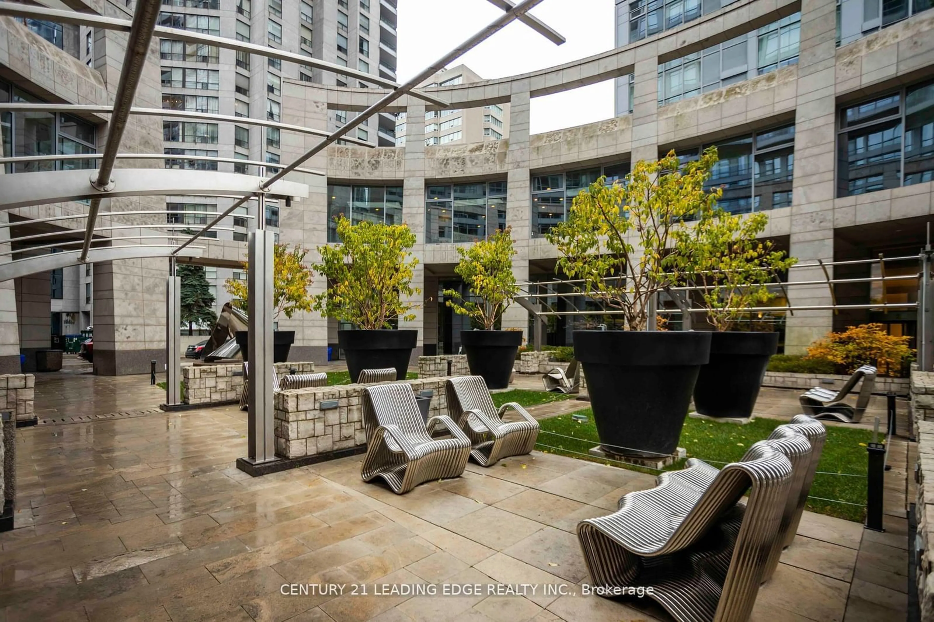 Patio, city buildings view from balcony for 2191 Yonge St #Loft #5, Toronto Ontario M4S 3H8