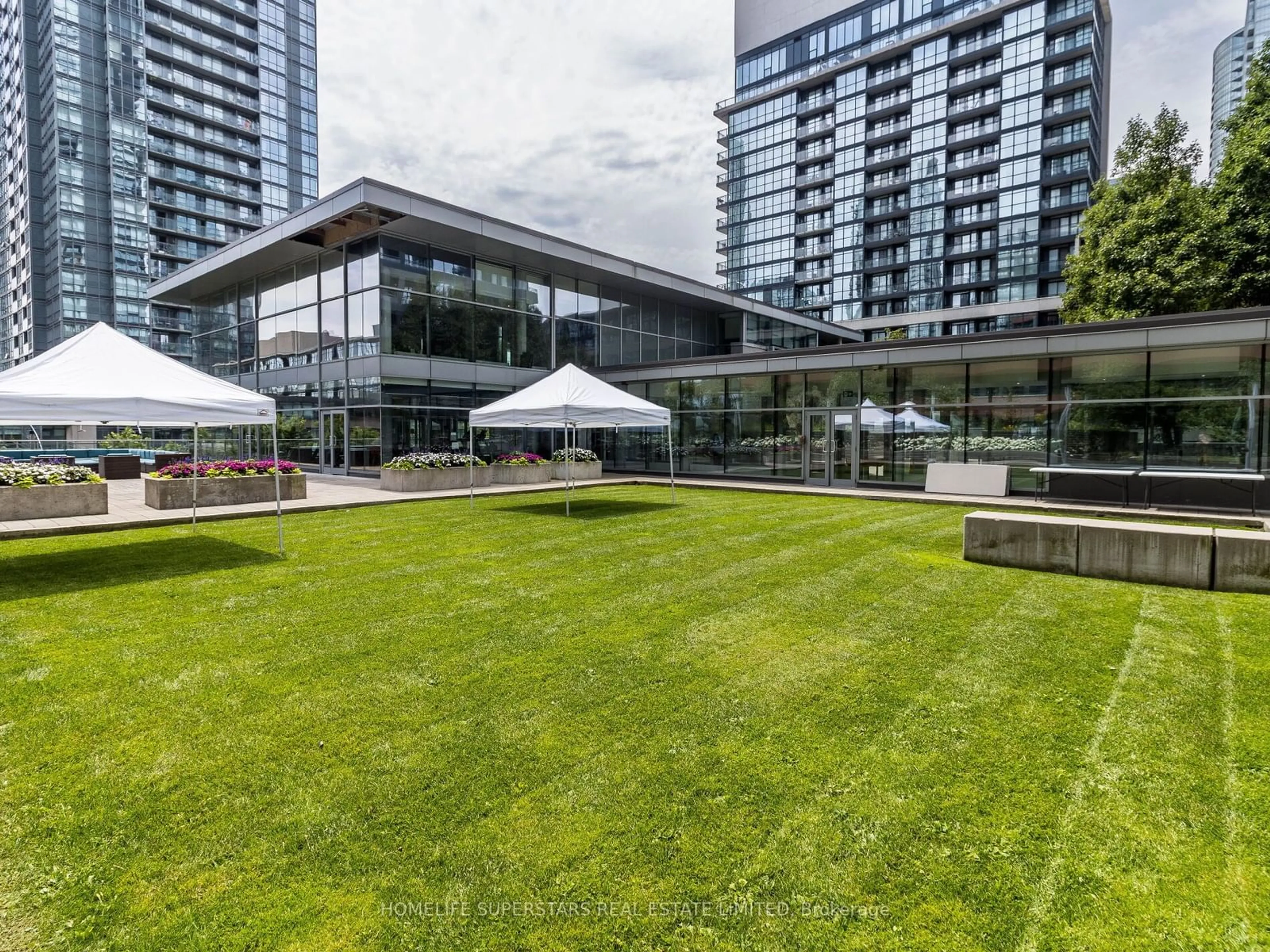 Patio, city buildings view from balcony for 25 Telegram Mews #1603, Toronto Ontario M5V 3Z2