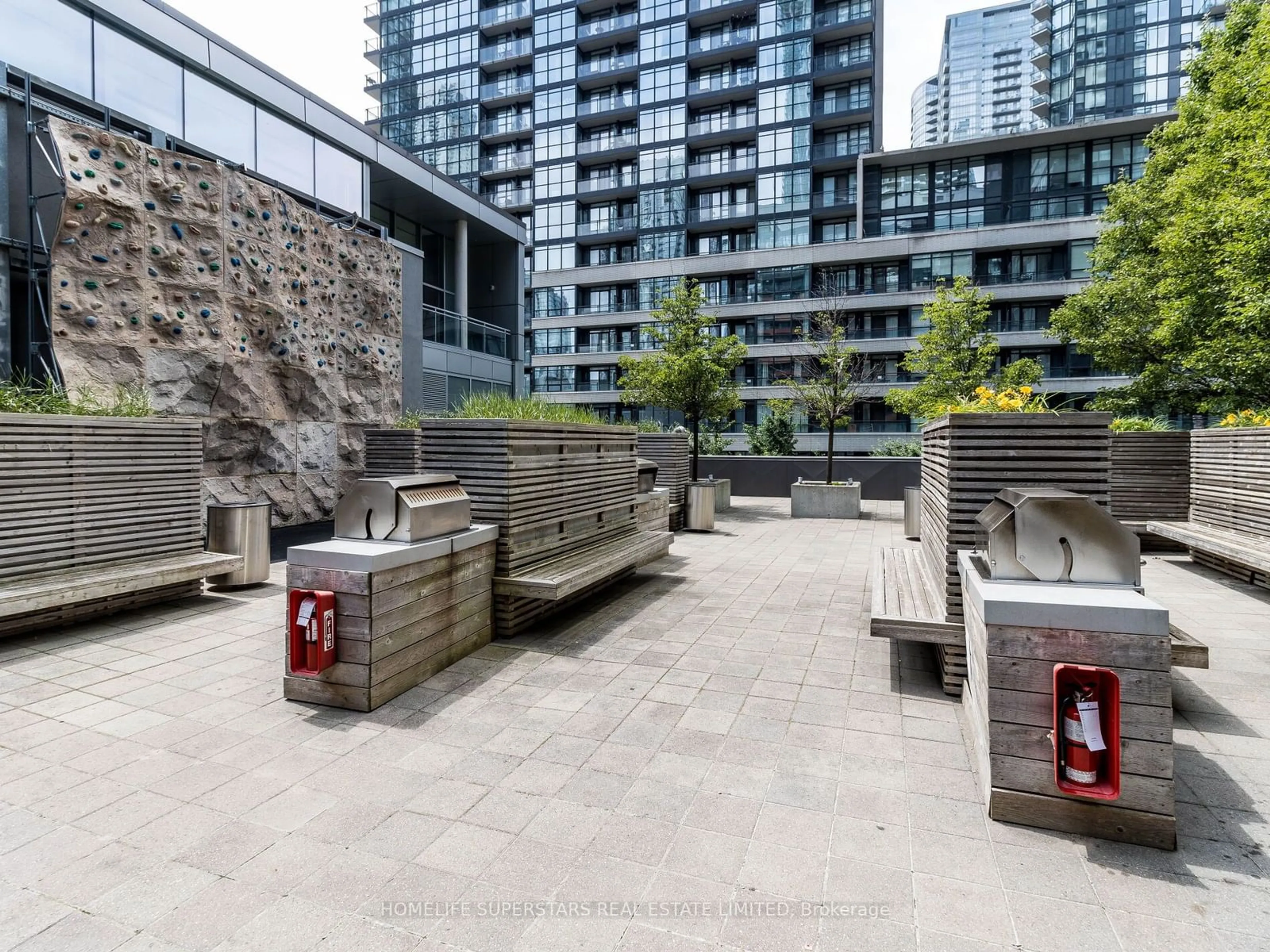 Patio, city buildings view from balcony for 25 Telegram Mews #1603, Toronto Ontario M5V 3Z2