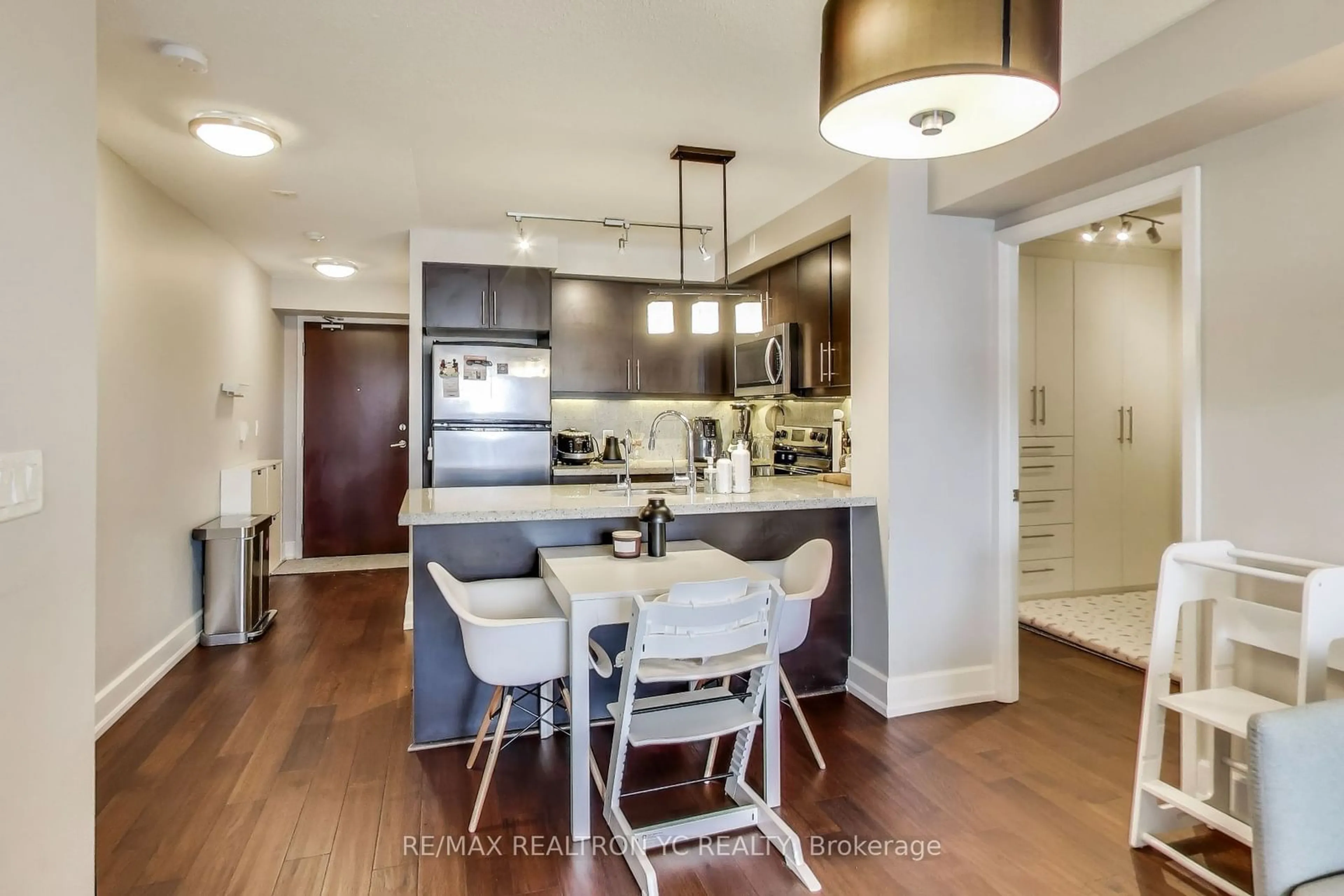 Open concept kitchen, wood/laminate floor for 676 Sheppard Ave #415, Toronto Ontario M2K 3E7