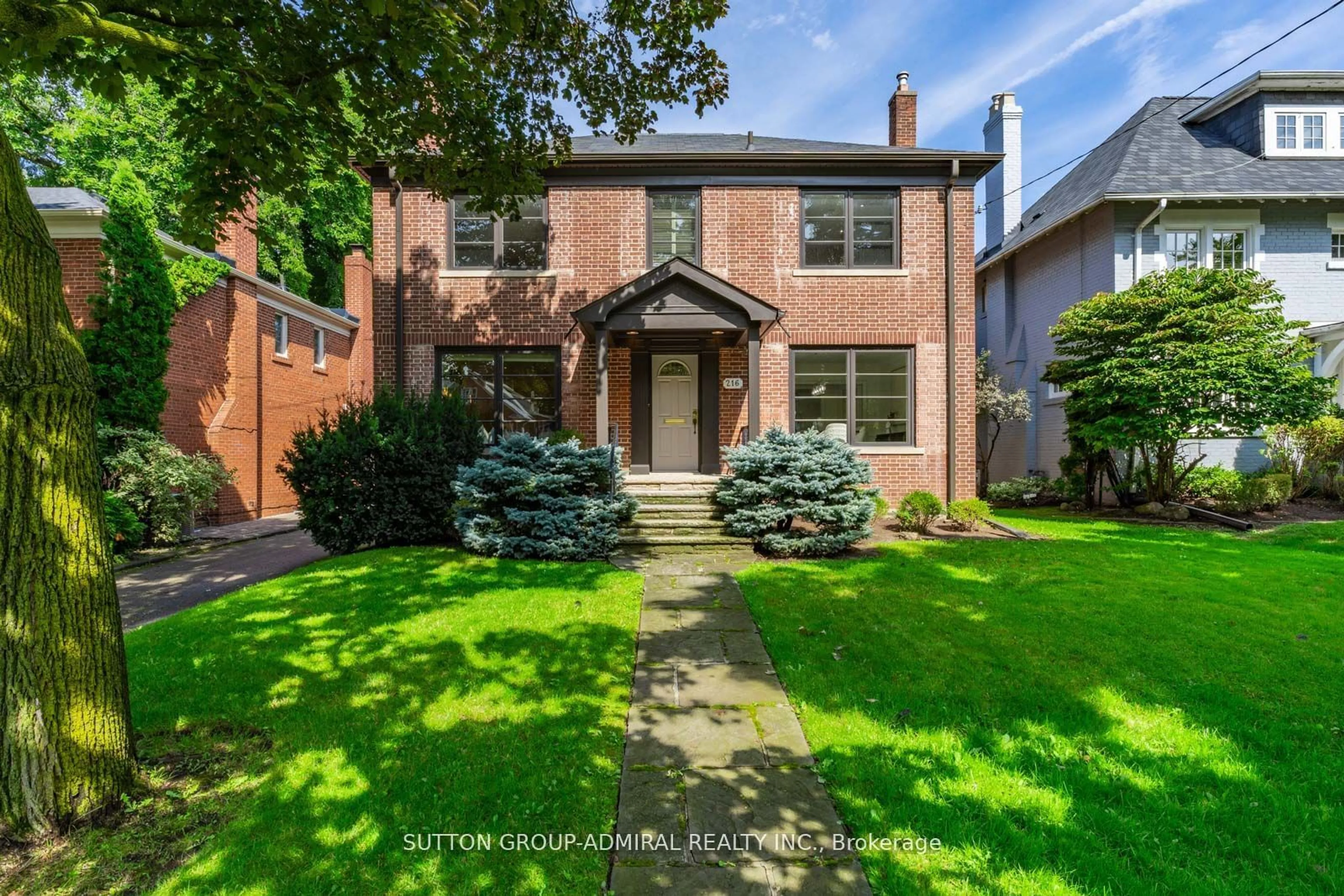 Home with brick exterior material, street for 216 Glencairn Ave, Toronto Ontario M4R 1N2