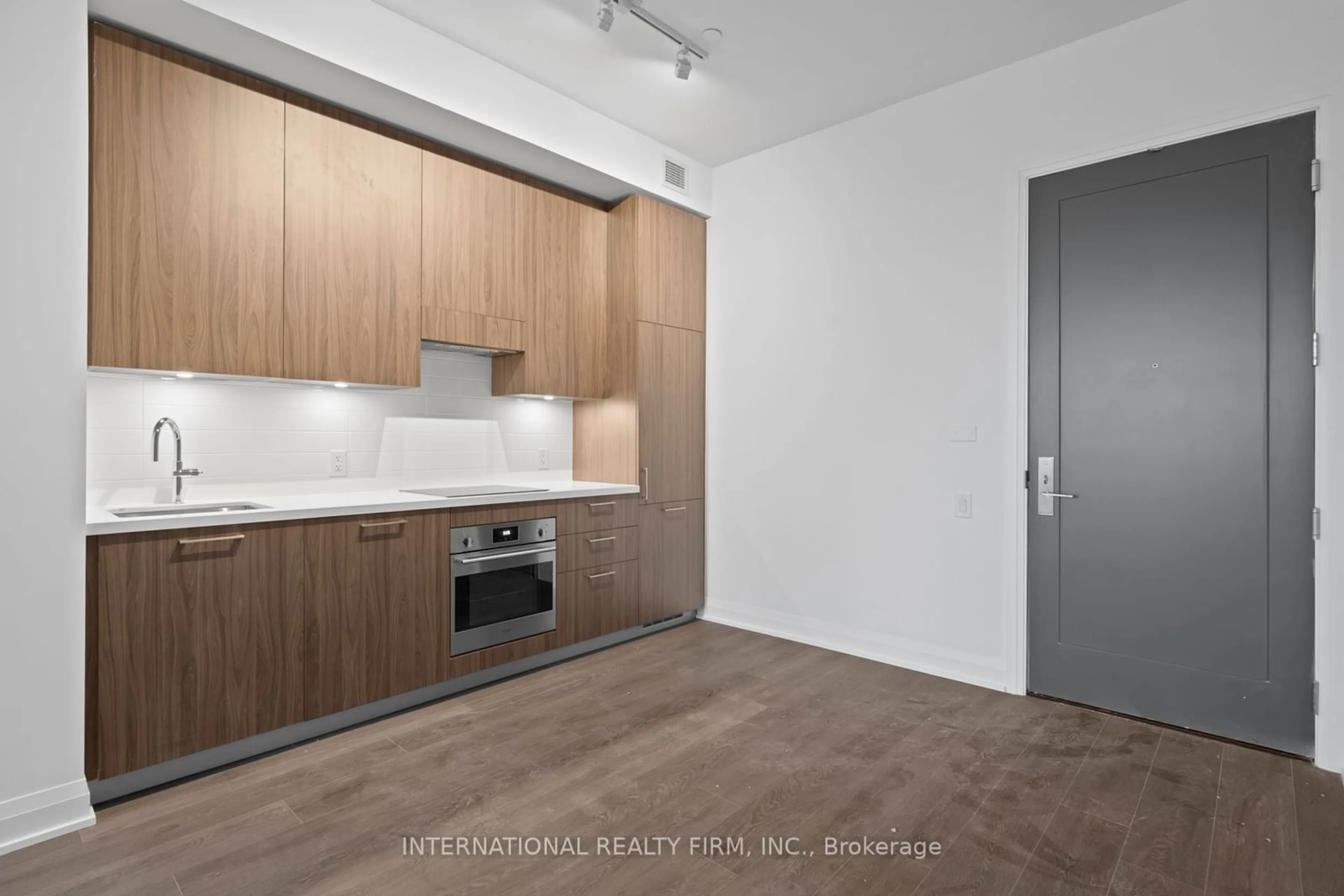 Standard kitchen, wood/laminate floor for 33 Frederick Todd Way #209, Toronto Ontario M4G 0C9