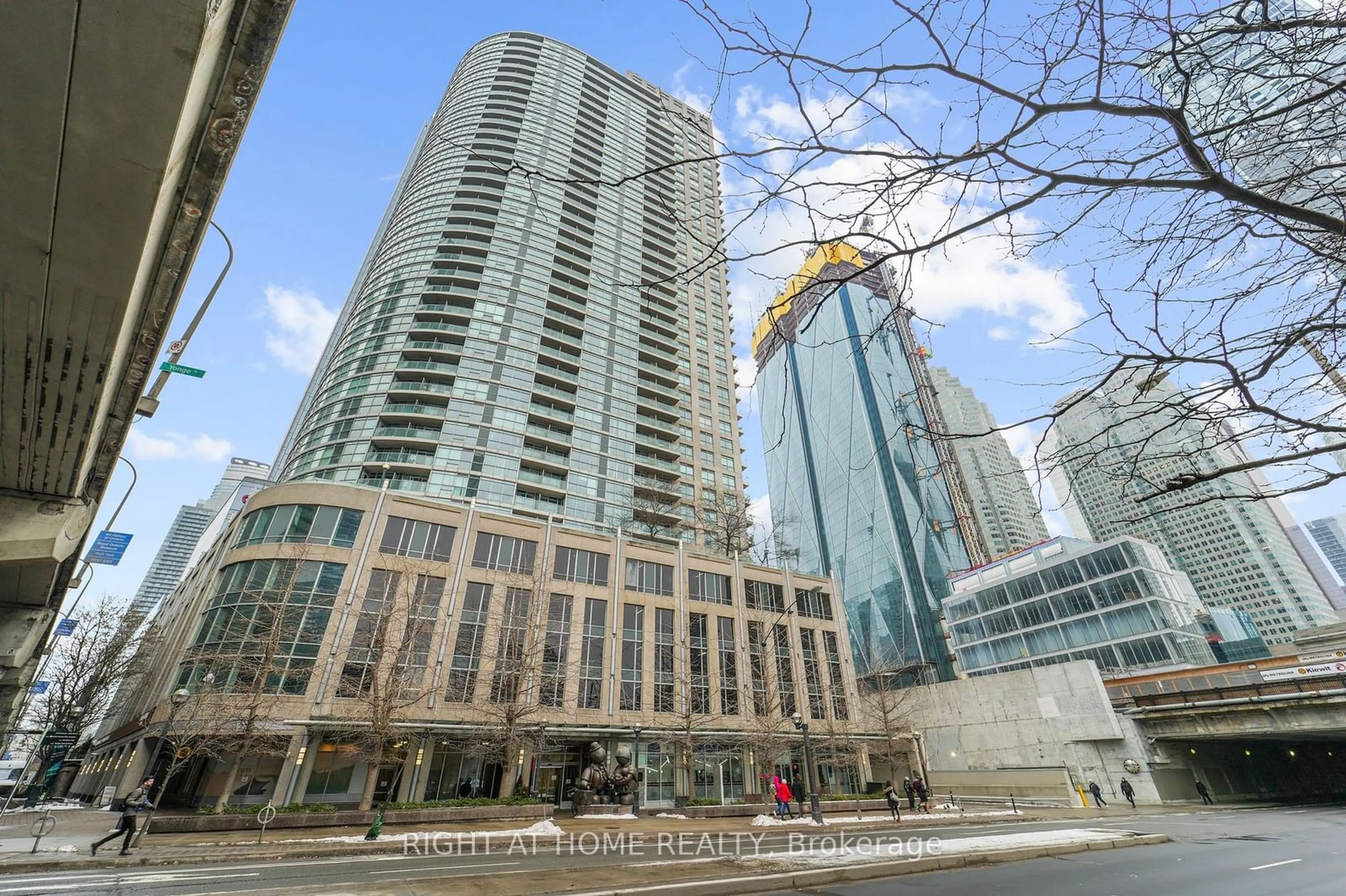 Patio, city buildings view from balcony for 18 Yonge St #2315, Toronto Ontario M5E 1Z8