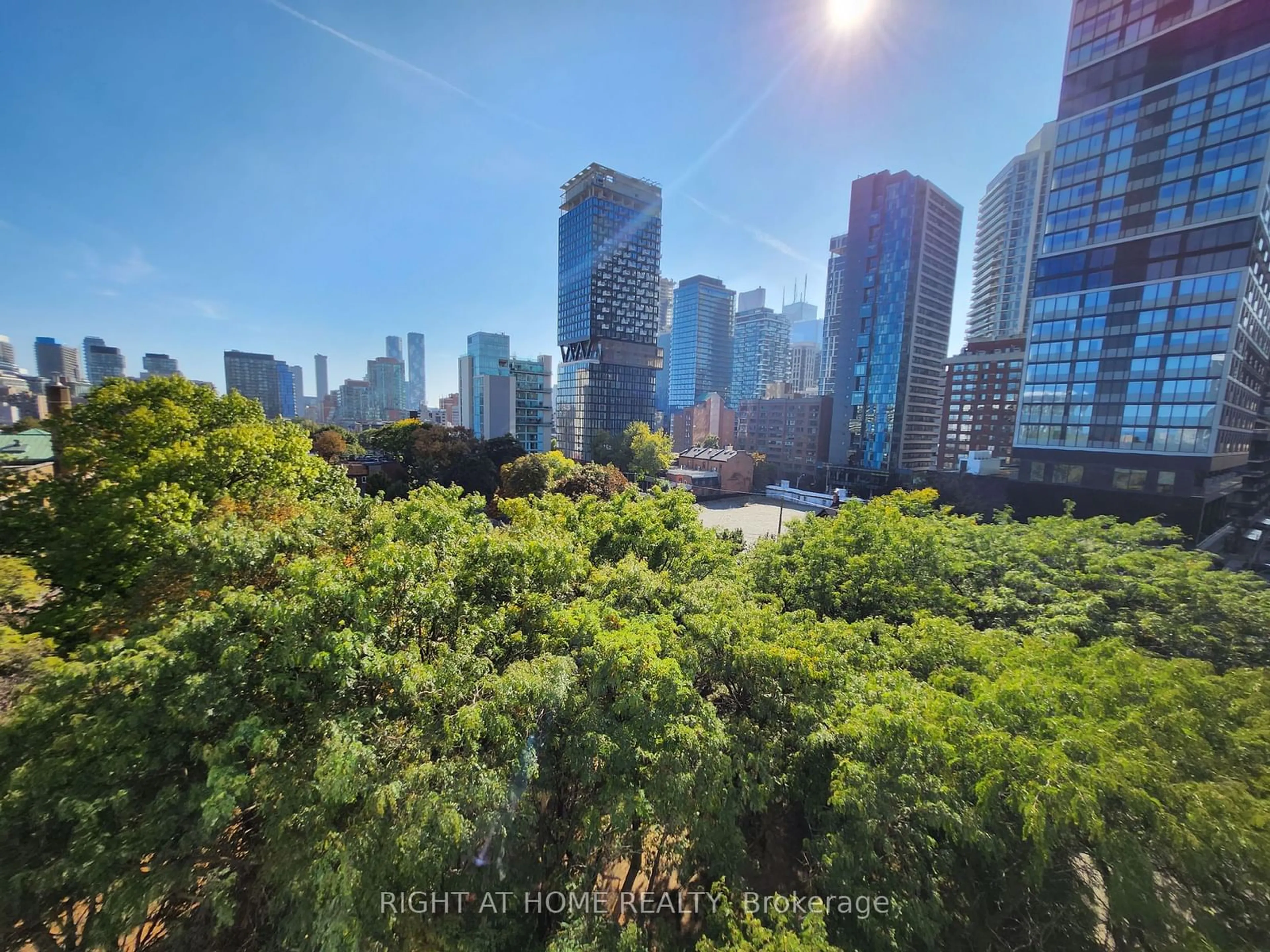 A pic from outside/outdoor area/front of a property/back of a property/a pic from drone, city buildings view from balcony for 219 Dundas St #805, Toronto Ontario M5A 0V1