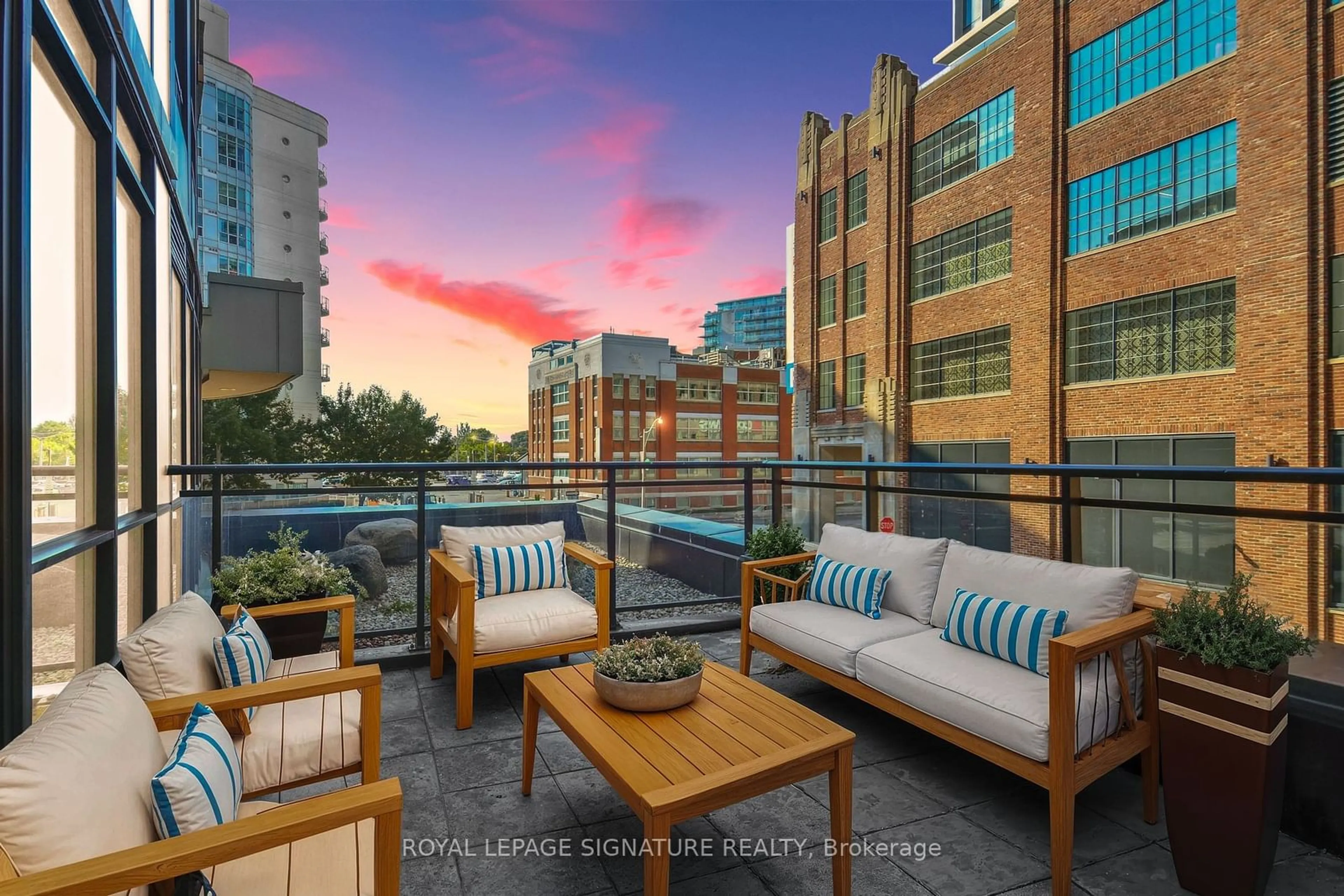 Patio, city buildings view from balcony for 38 Dan Leckie Way #223, Toronto Ontario M5V 2V6