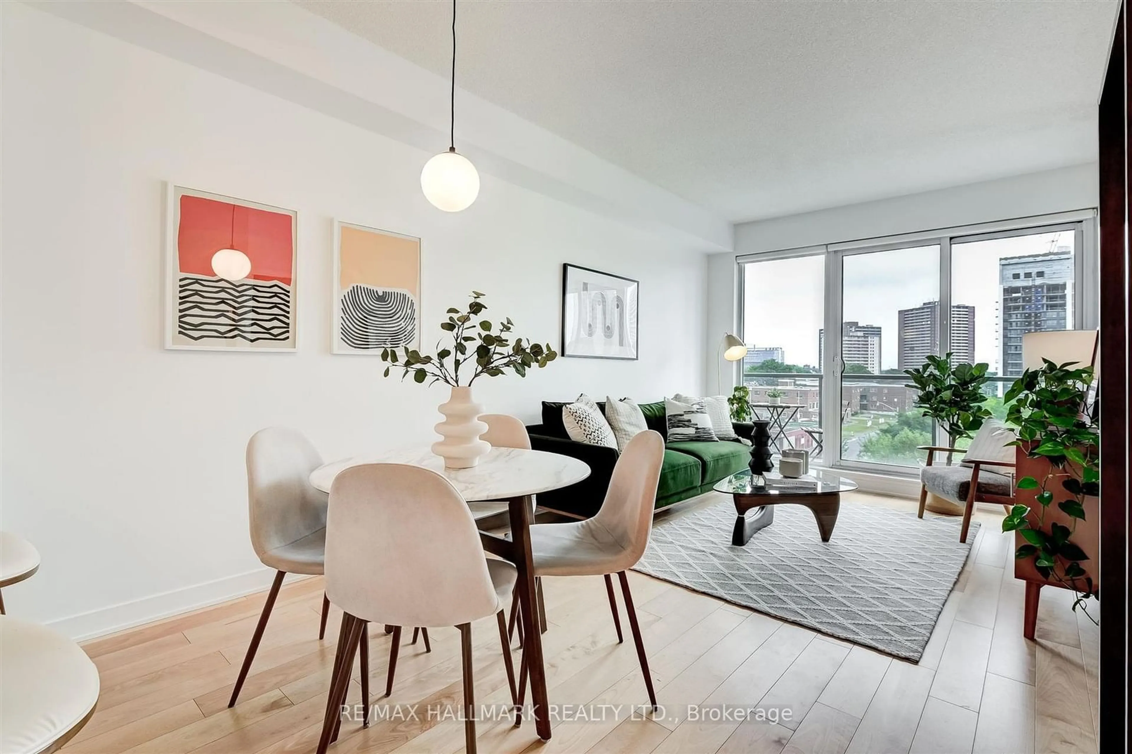 Living room with furniture, wood/laminate floor for 260 Sackville St #506, Toronto Ontario M5A 0B3