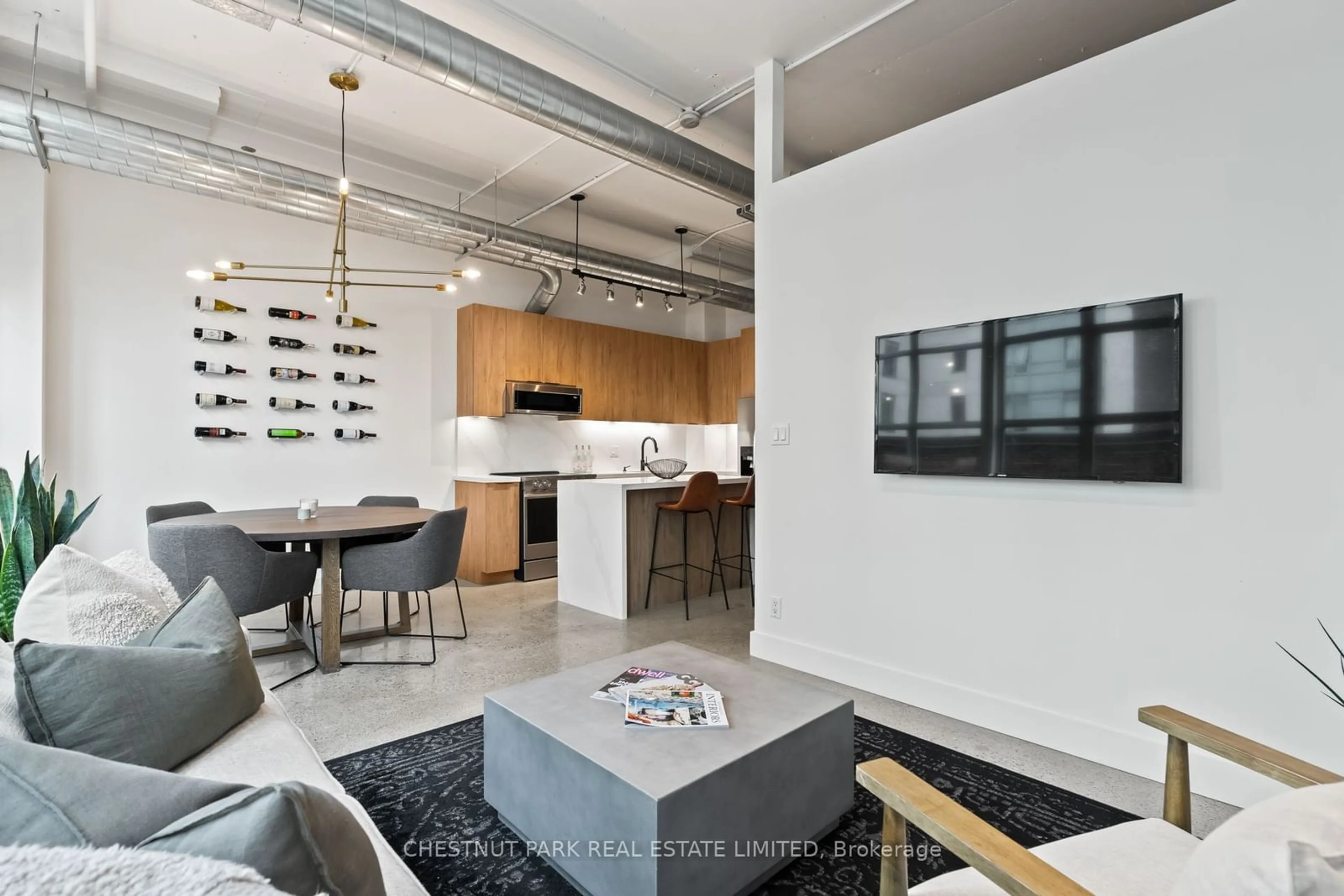 Open concept kitchen, cement floor for 188 Eglinton Ave #311, Toronto Ontario M4P 2X7