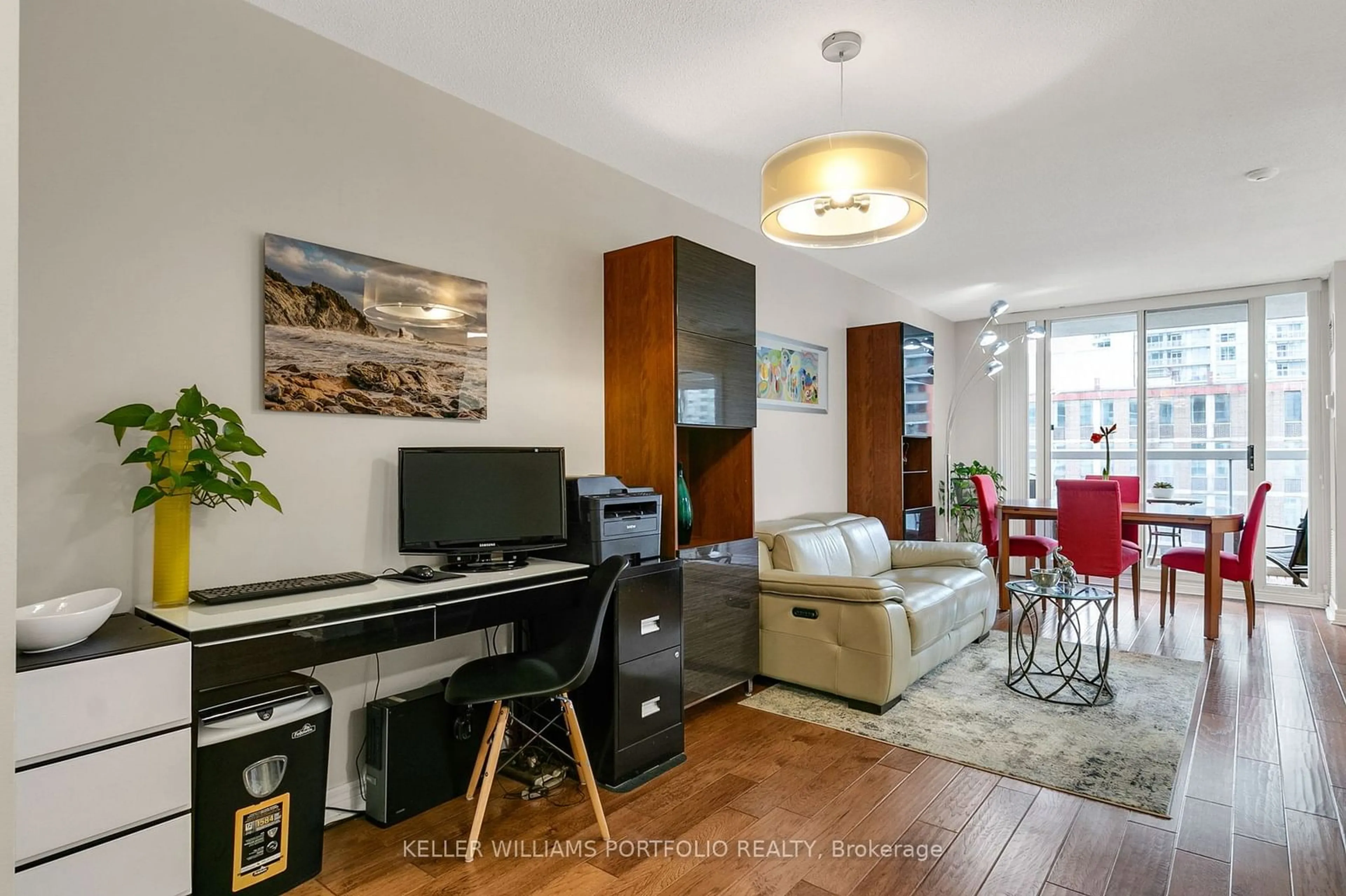 Living room with furniture, wood/laminate floor for 43 Eglinton Ave #1009, Toronto Ontario M4P 1A2