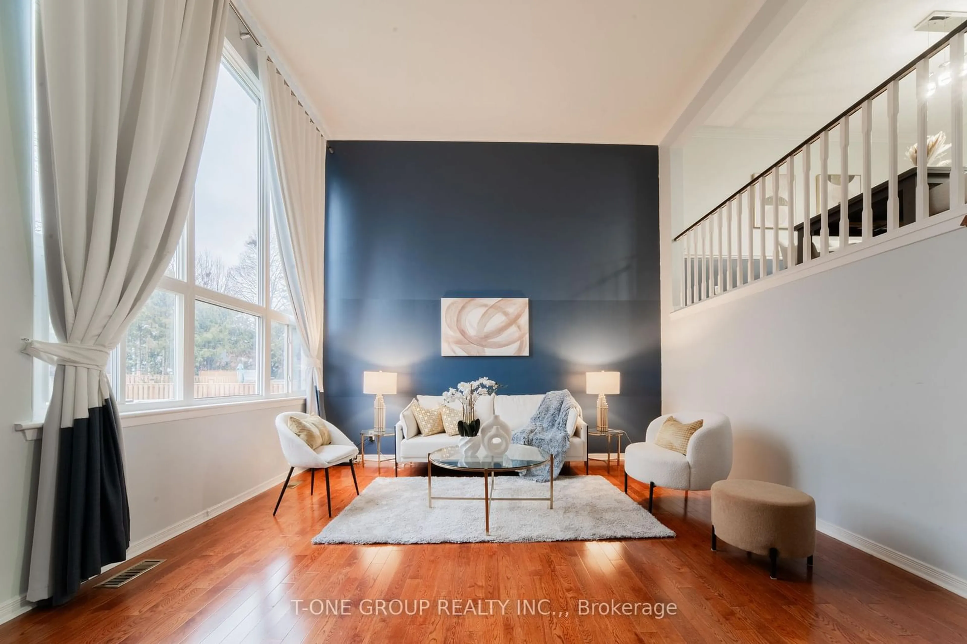 Living room with furniture, wood/laminate floor for 147 Chipwood Cres, Toronto Ontario M2J 3X6