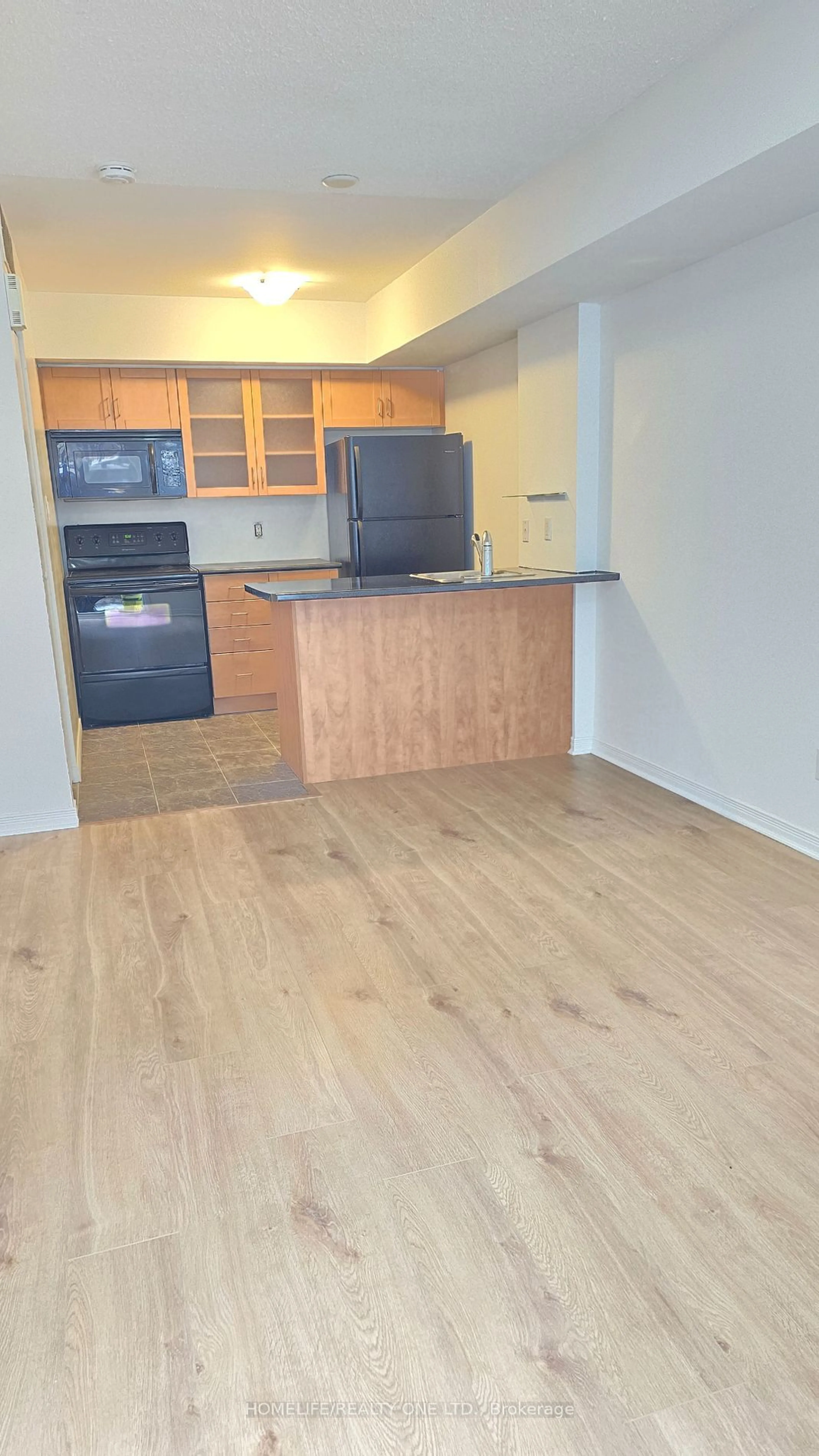 Standard kitchen, wood/laminate floor for 21 Pirandello St #1212, Toronto Ontario M6K 3R7