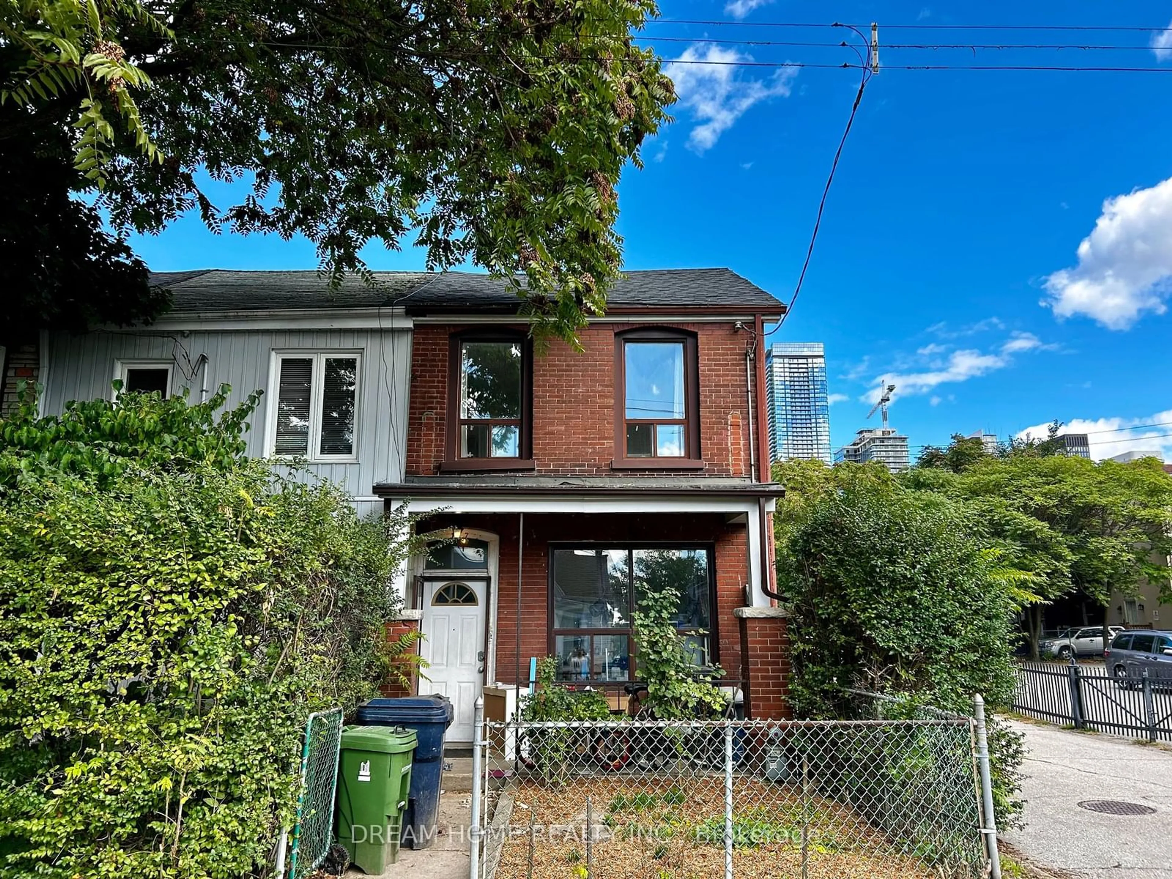 Home with brick exterior material, street for 107 Huron st St, Toronto Ontario M5T 2A9