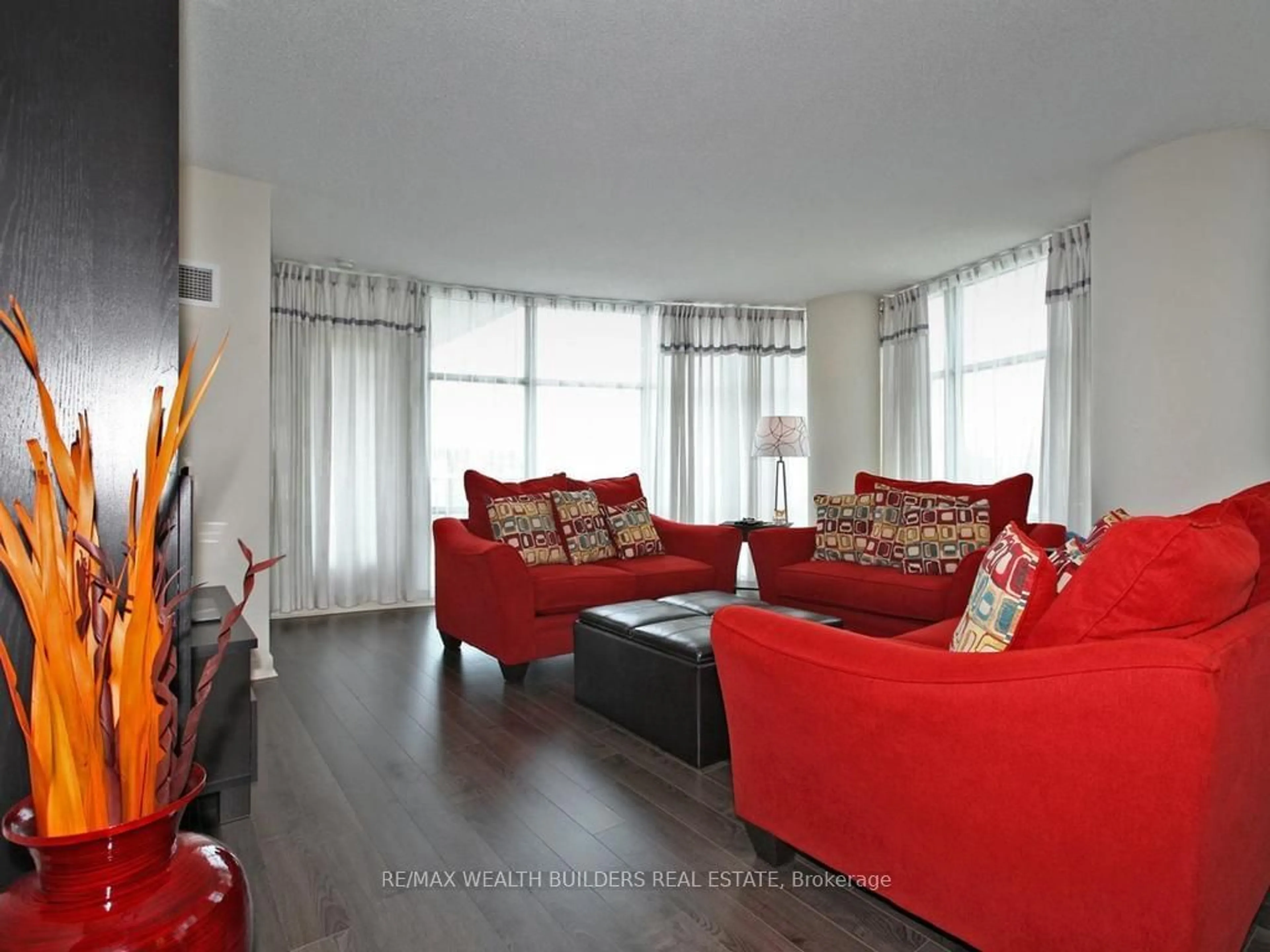 Living room with furniture, wood/laminate floor for 35 Mariner Terr #712, Toronto Ontario M5V 3V9