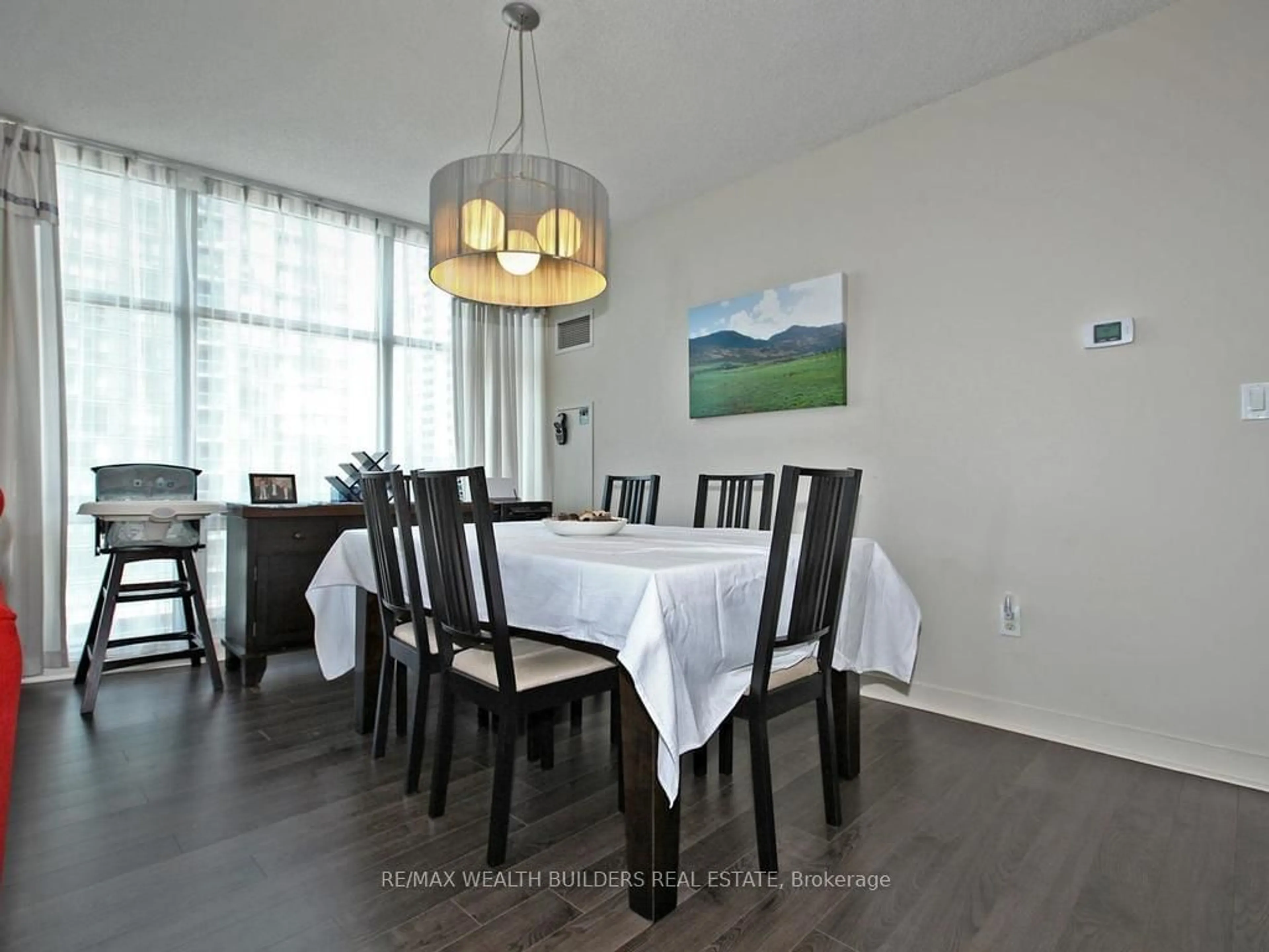 Dining room, wood/laminate floor for 35 Mariner Terr #712, Toronto Ontario M5V 3V9