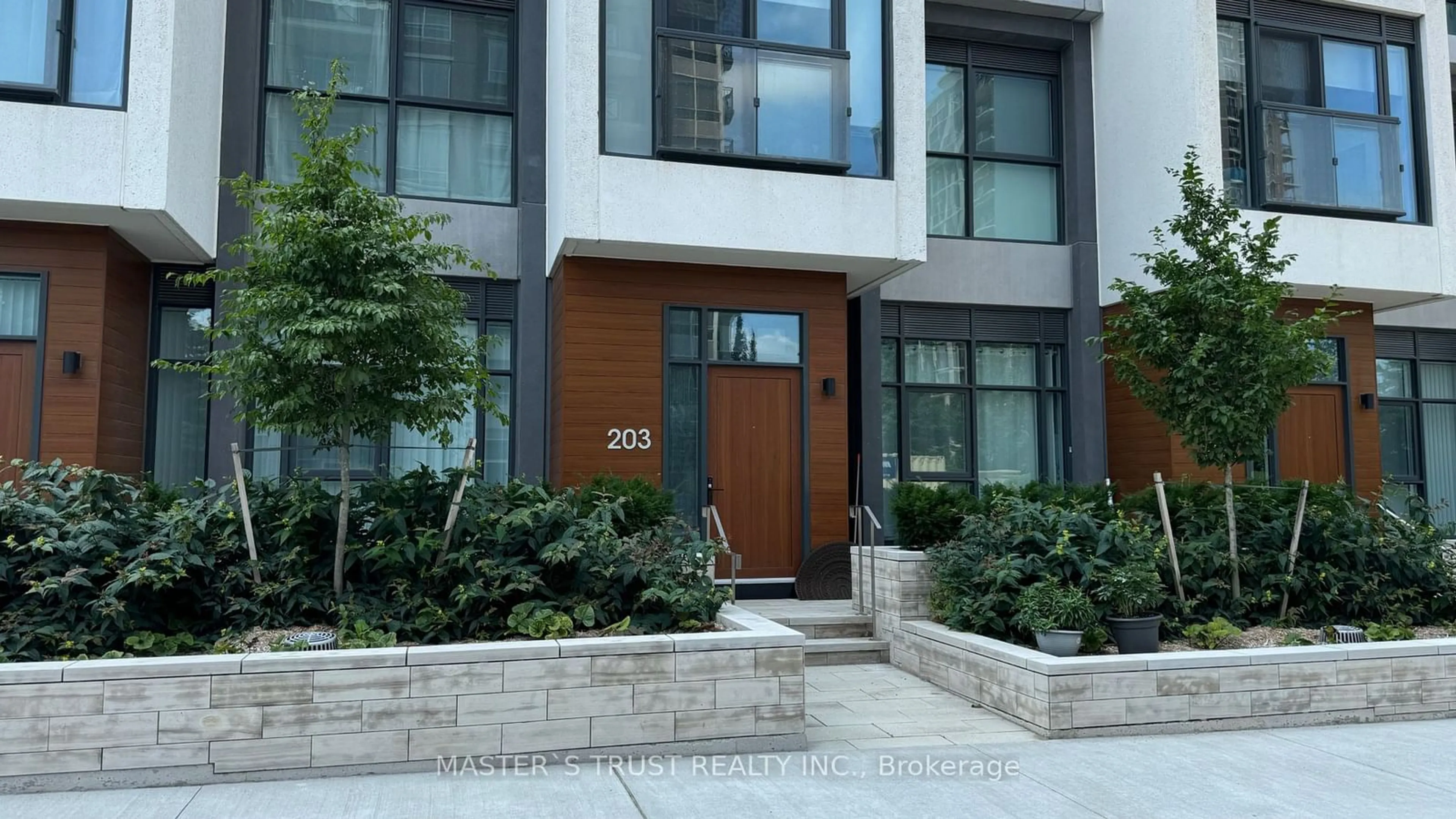 Home with brick exterior material, street for 30 Inn On The Park Dr #203, Toronto Ontario M3C 0P7