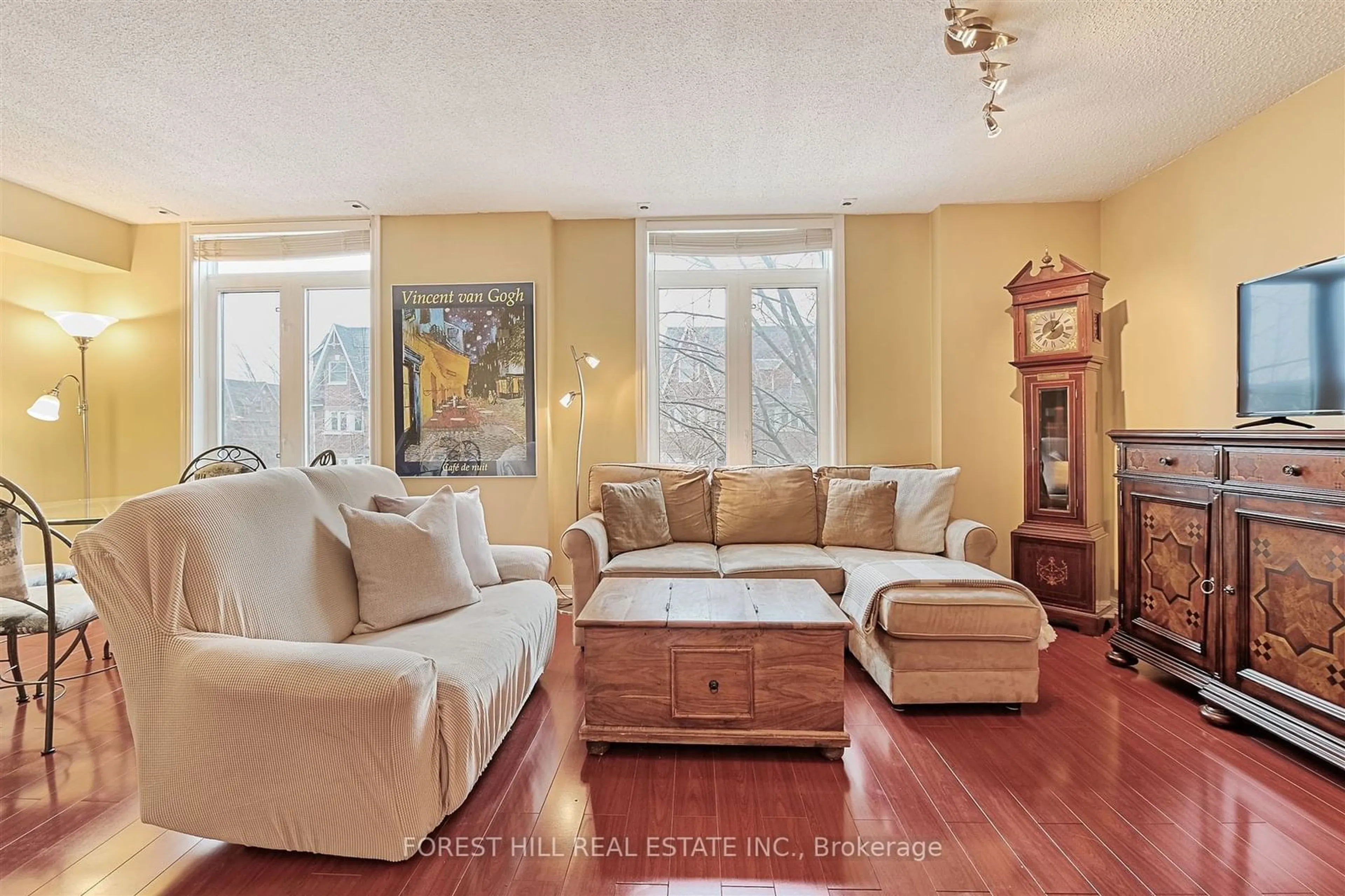 Living room with furniture, wood/laminate floor for 9 Shank St #904, Toronto Ontario M6J 3W9