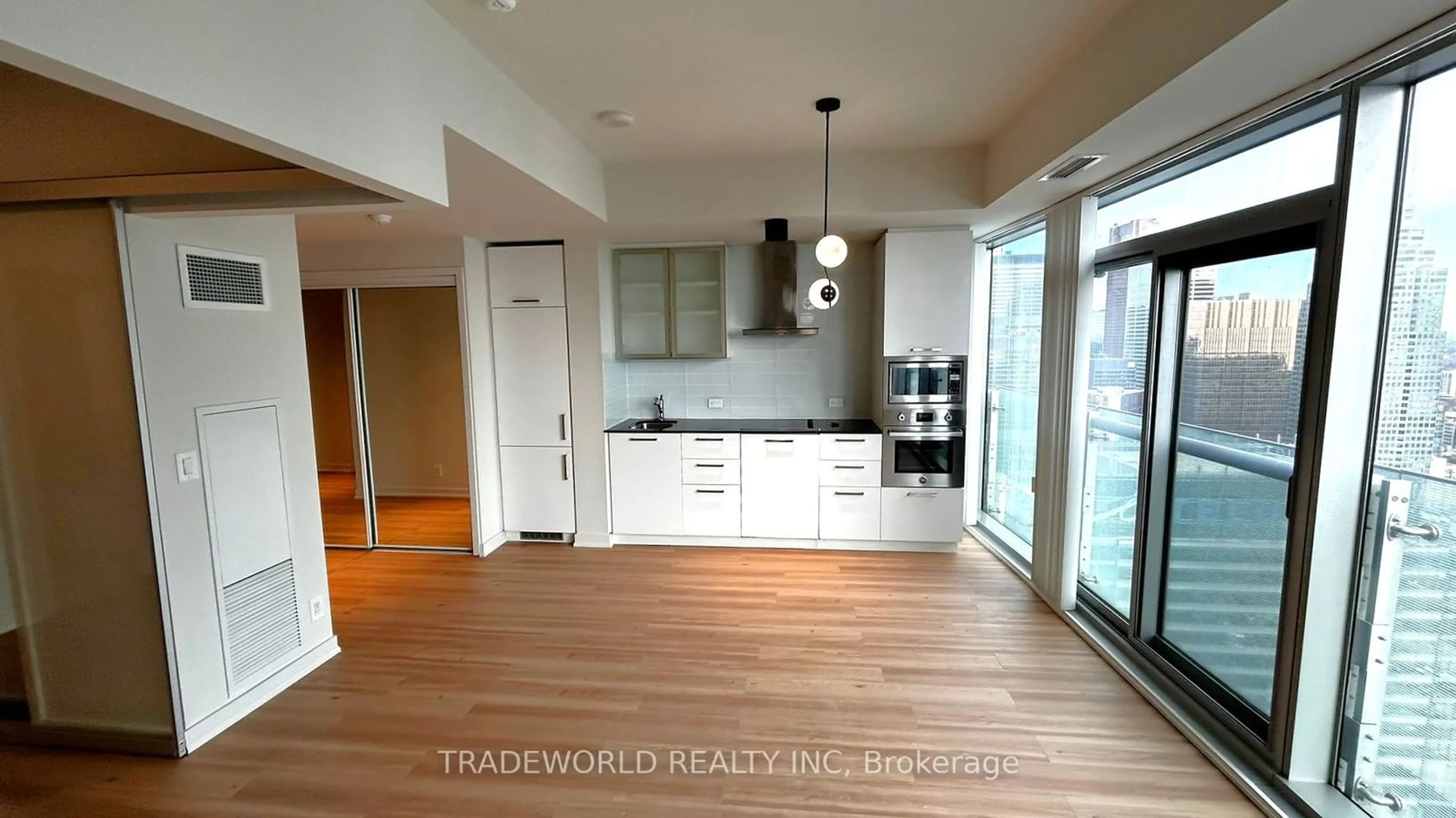 Open concept kitchen, wood/laminate floor for 14 York St #5012, Toronto Ontario M5J 0B1