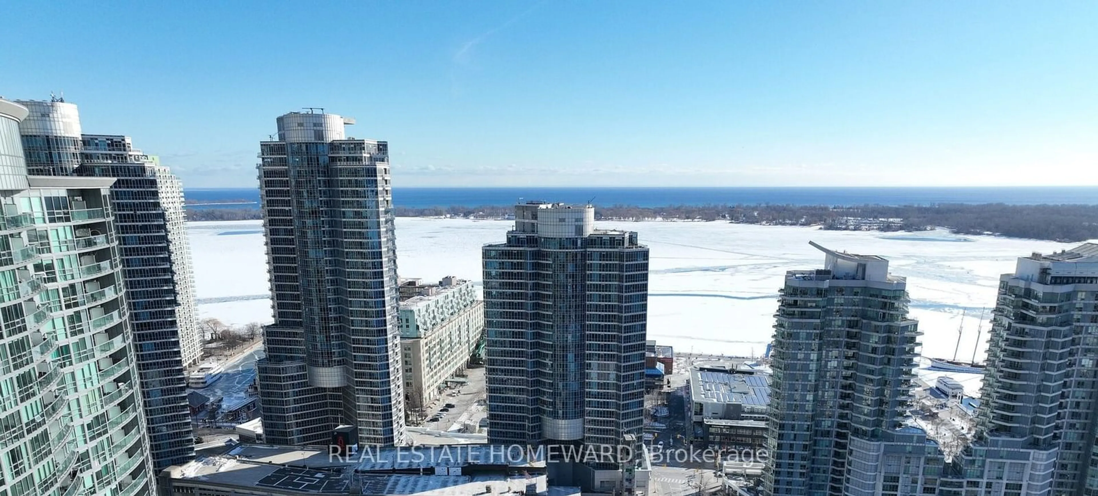 A pic from outside/outdoor area/front of a property/back of a property/a pic from drone, city buildings view from balcony for 218 Queens Quay #909, Toronto Ontario M5J 2Y6