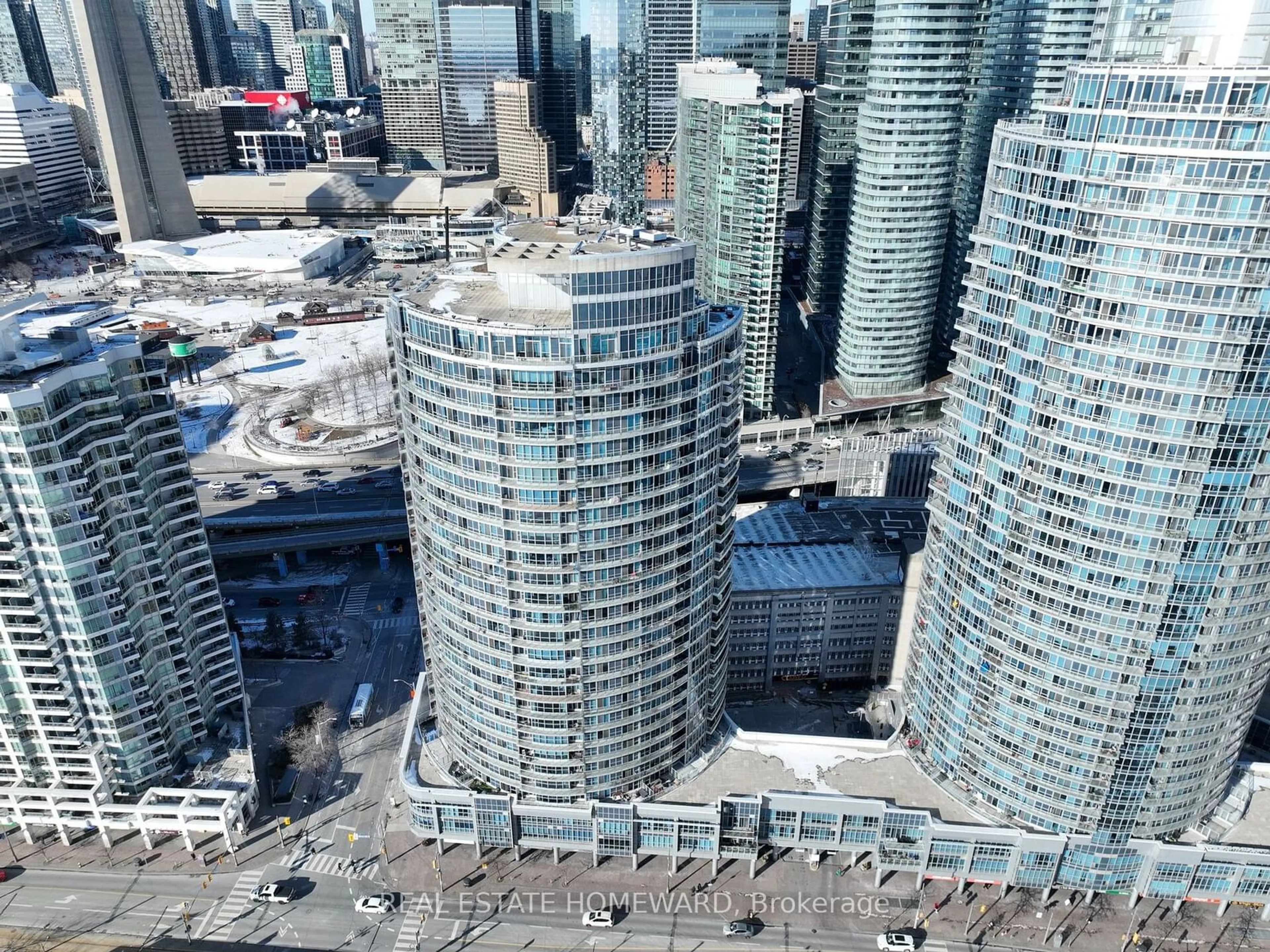 A pic from outside/outdoor area/front of a property/back of a property/a pic from drone, city buildings view from balcony for 218 Queens Quay #909, Toronto Ontario M5J 2Y6