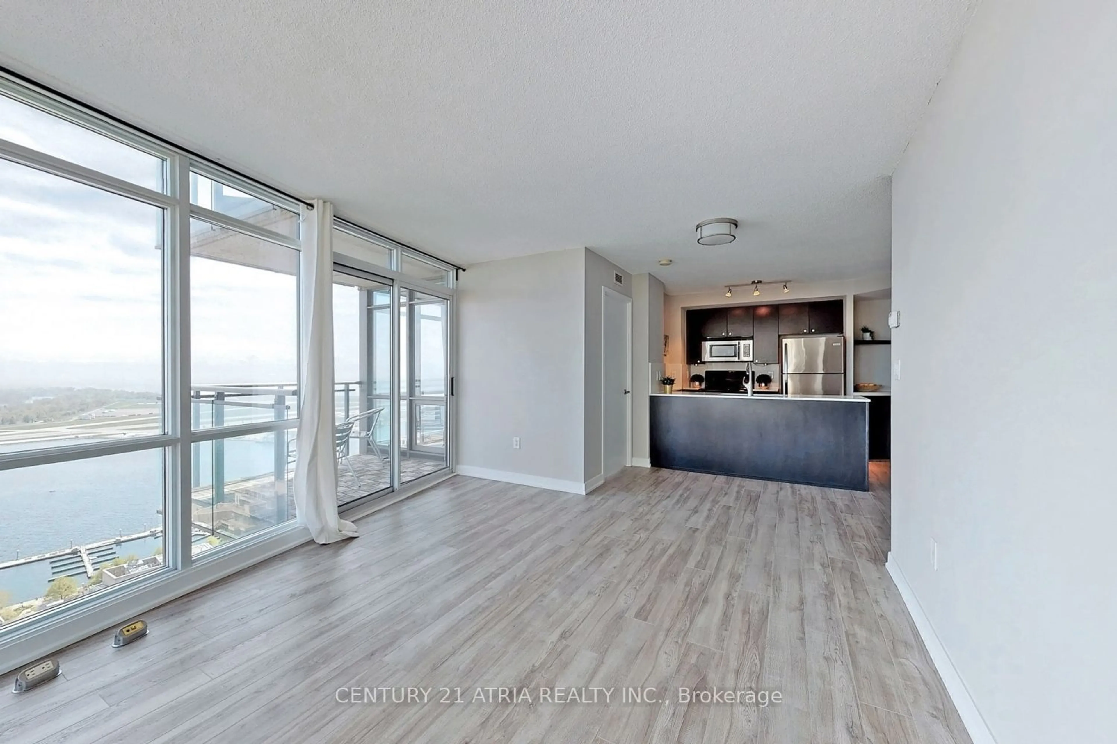 Open concept kitchen, wood/laminate floor for 11 Brunel Crt #3910, Toronto Ontario M5V 3Y3