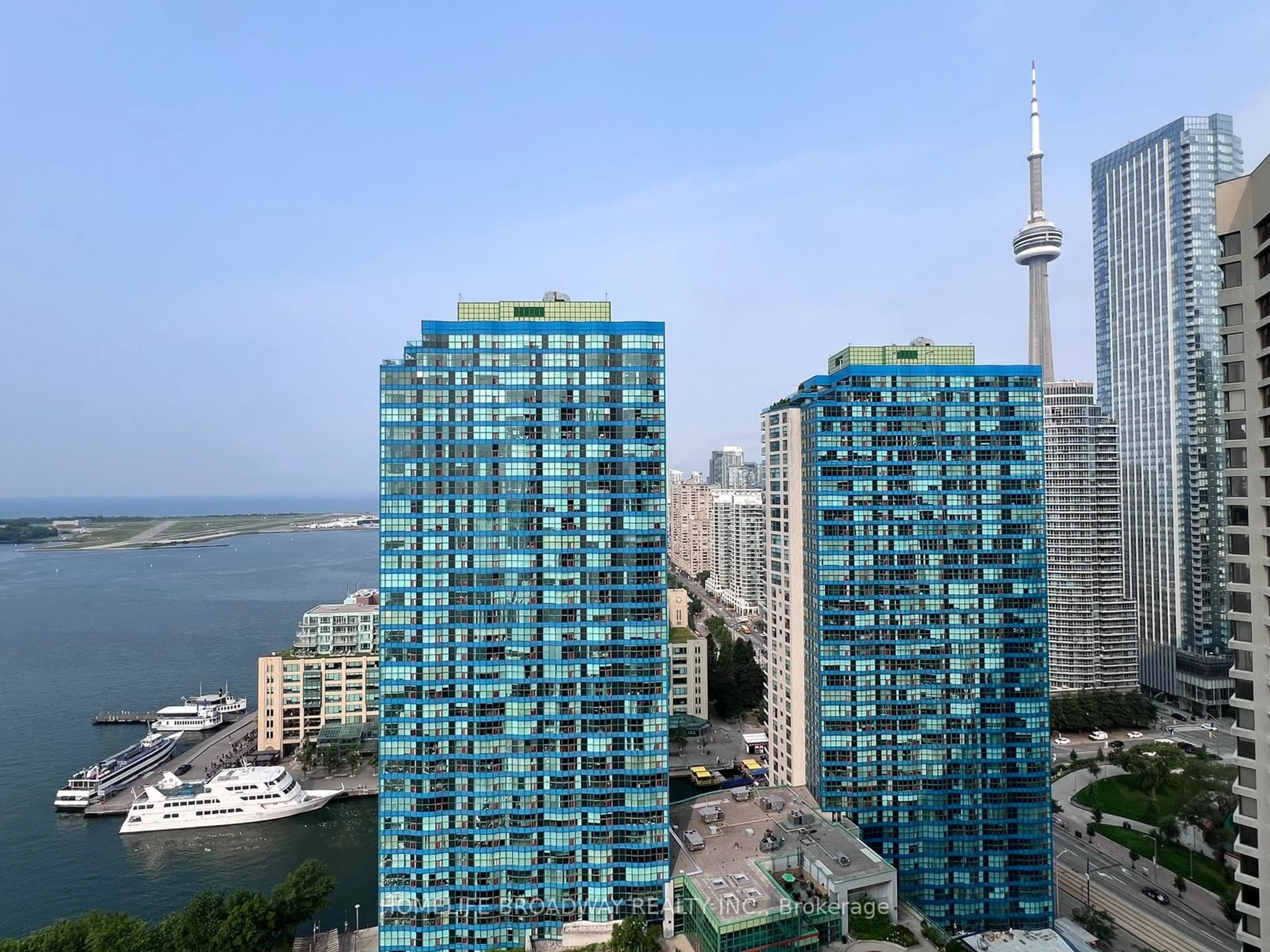 Balcony in the apartment, city buildings view from balcony for 65 Harbour Sq #3001, Toronto Ontario M5J 2L4