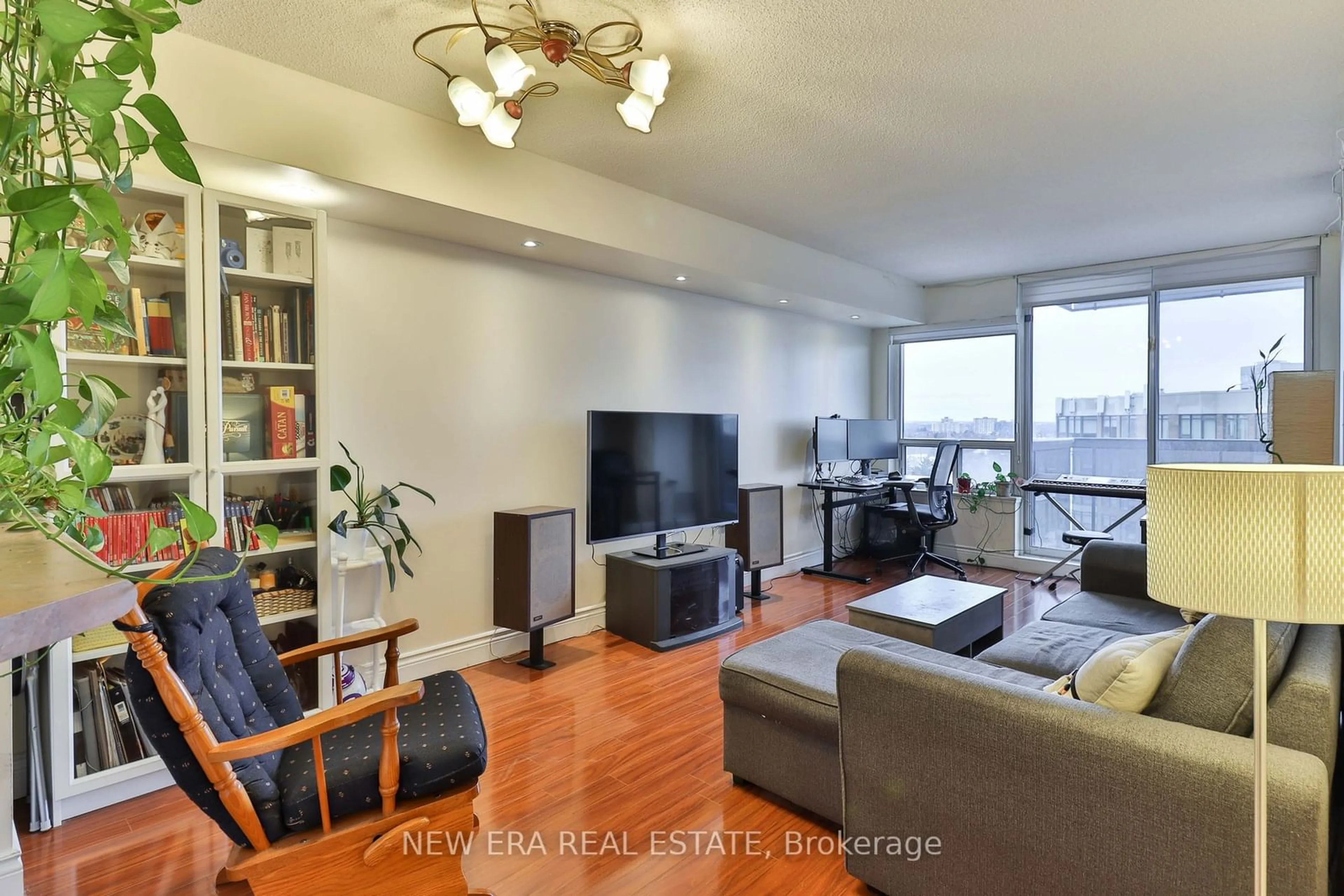 Living room with furniture, wood/laminate floor for 35 Finch Ave #1507, Toronto Ontario M2N 6Z8