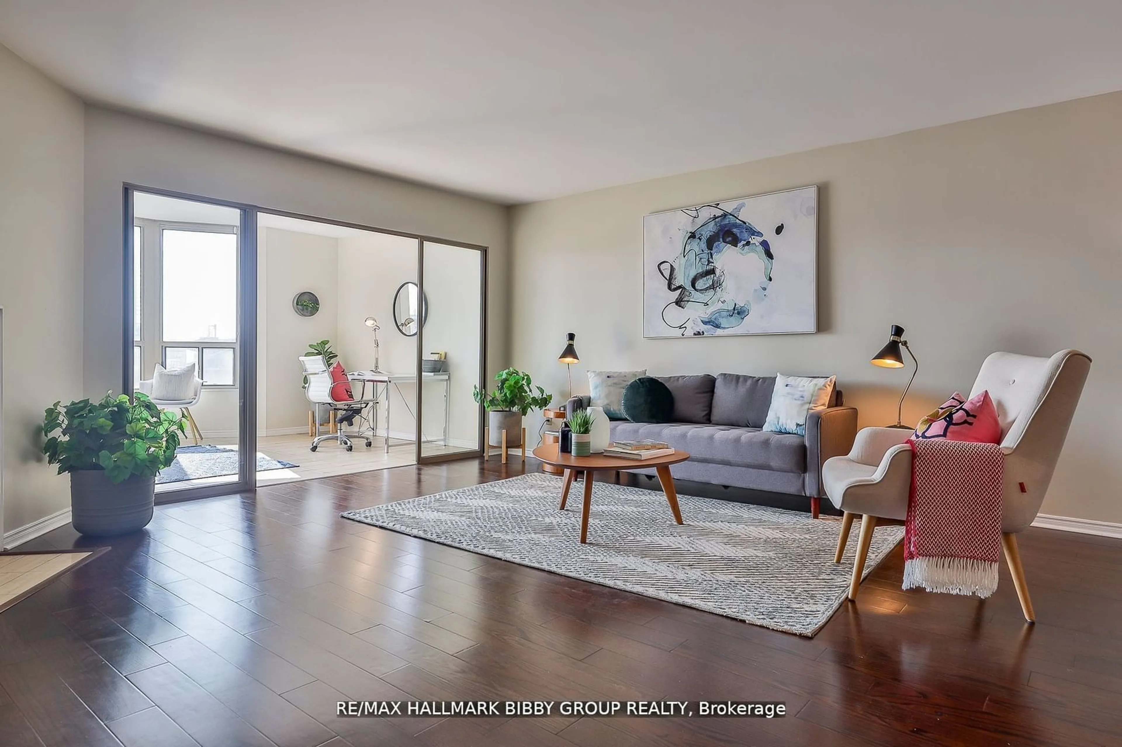 Living room with furniture, wood/laminate floor for 160 Frederick St #803, Toronto Ontario M5A 4H9