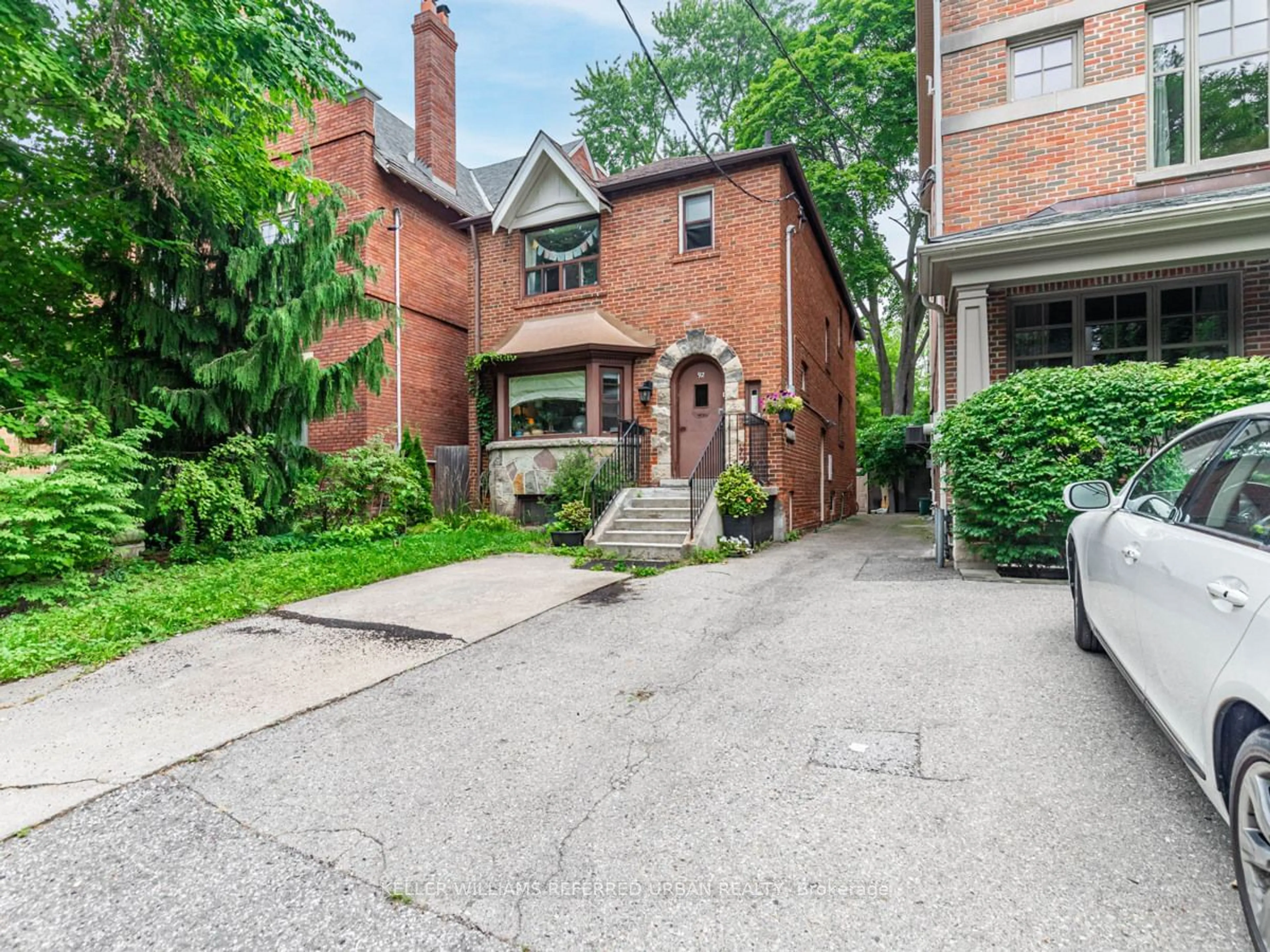 Home with brick exterior material, street for 92 Lowther Ave, Toronto Ontario M5R 1E2