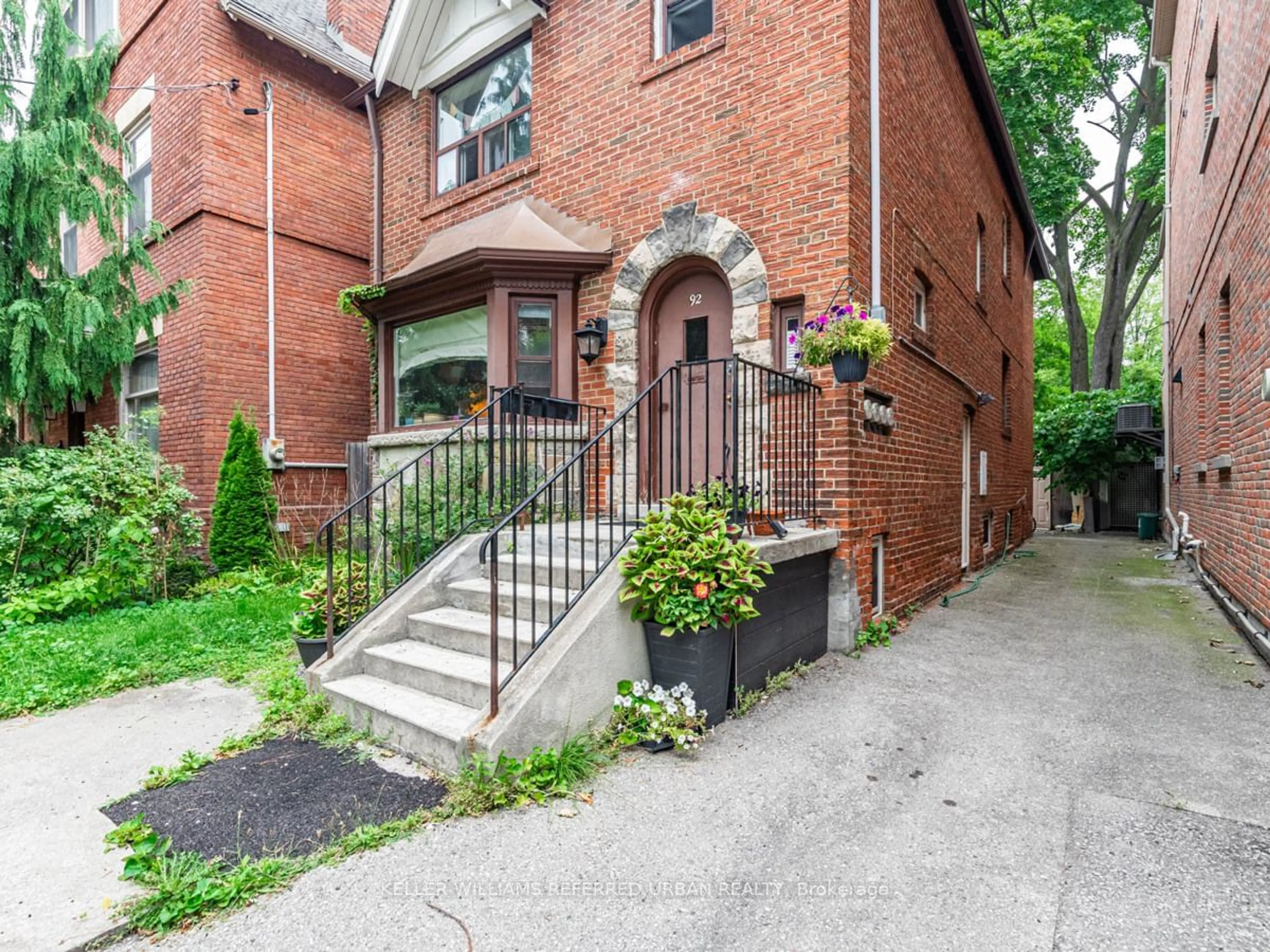 Home with brick exterior material, street for 92 Lowther Ave, Toronto Ontario M5R 1E2