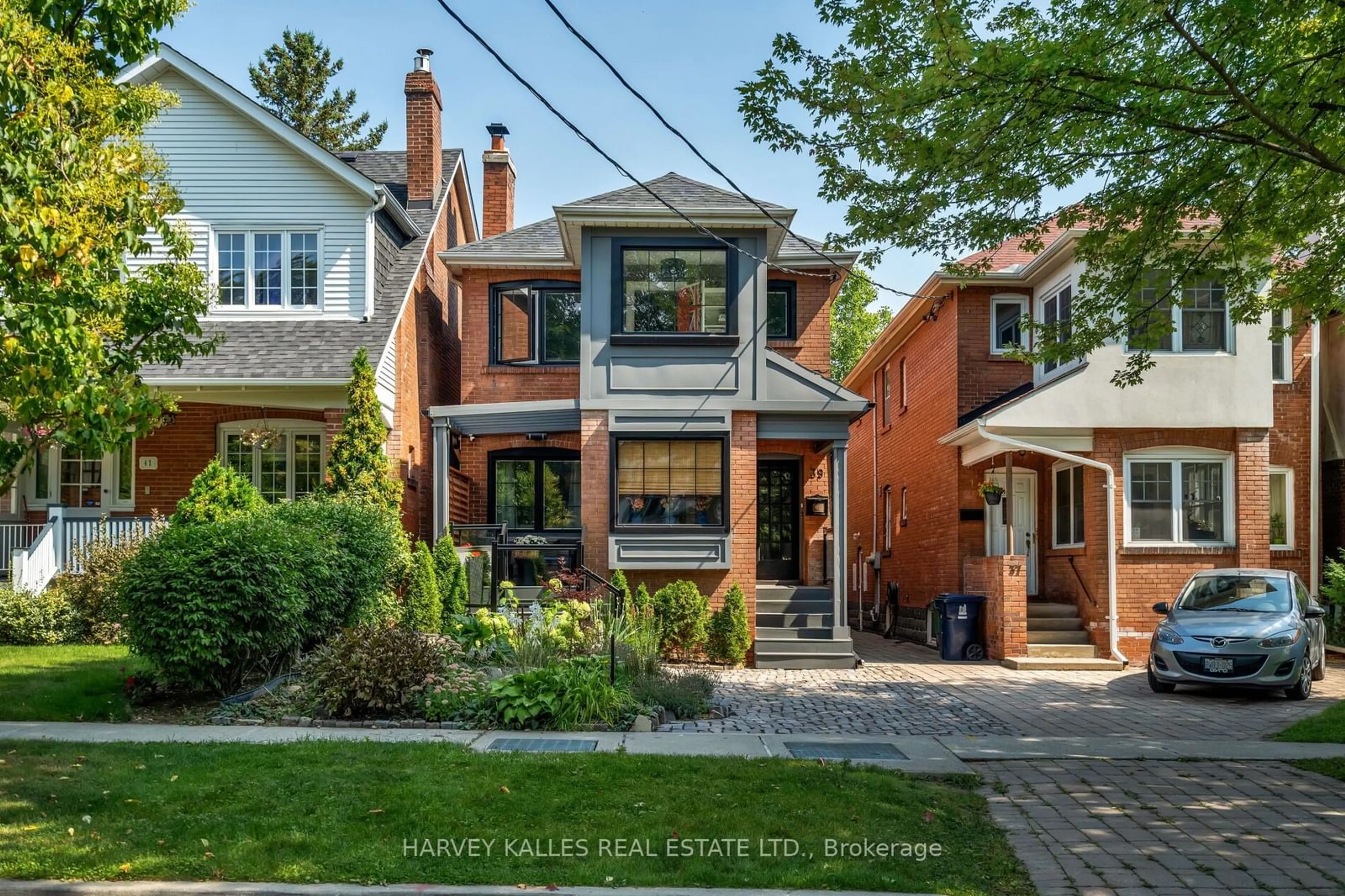 Home with brick exterior material, street for 39 Standish Ave, Toronto Ontario M4W 3B2