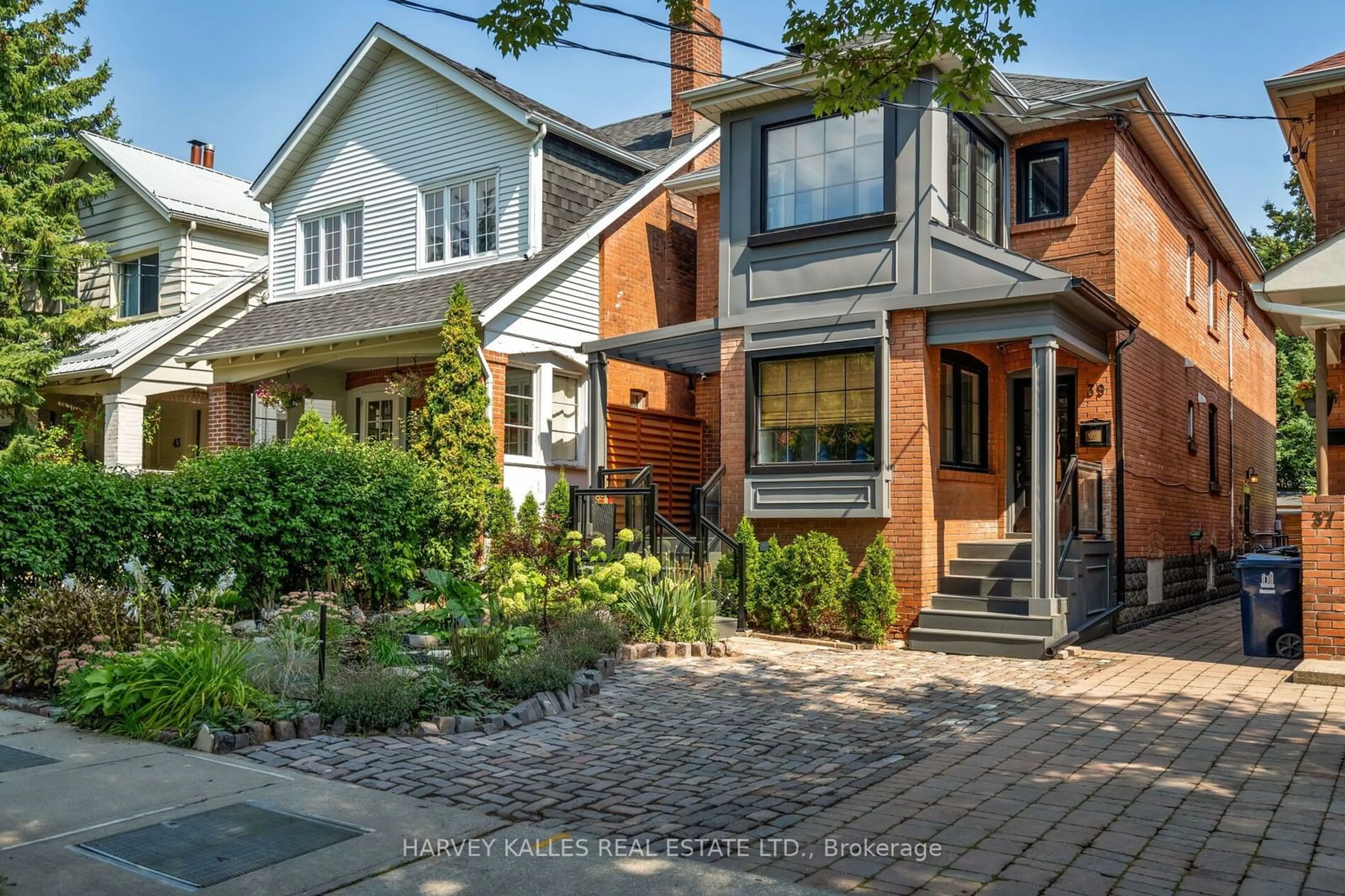 Home with brick exterior material, street for 39 Standish Ave, Toronto Ontario M4W 3B2