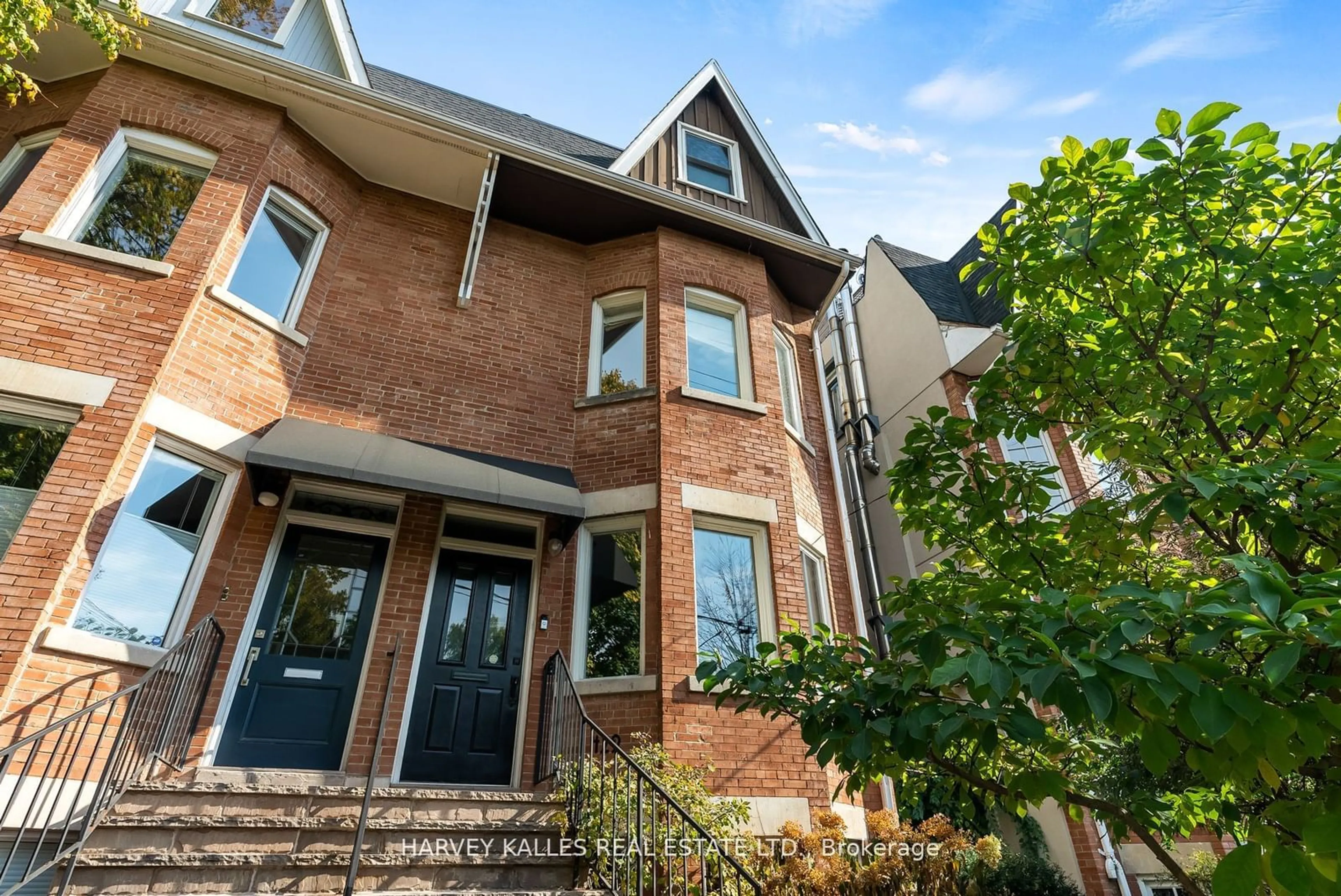 Home with brick exterior material, street for 429 Sackville St, Toronto Ontario M4X 1T1