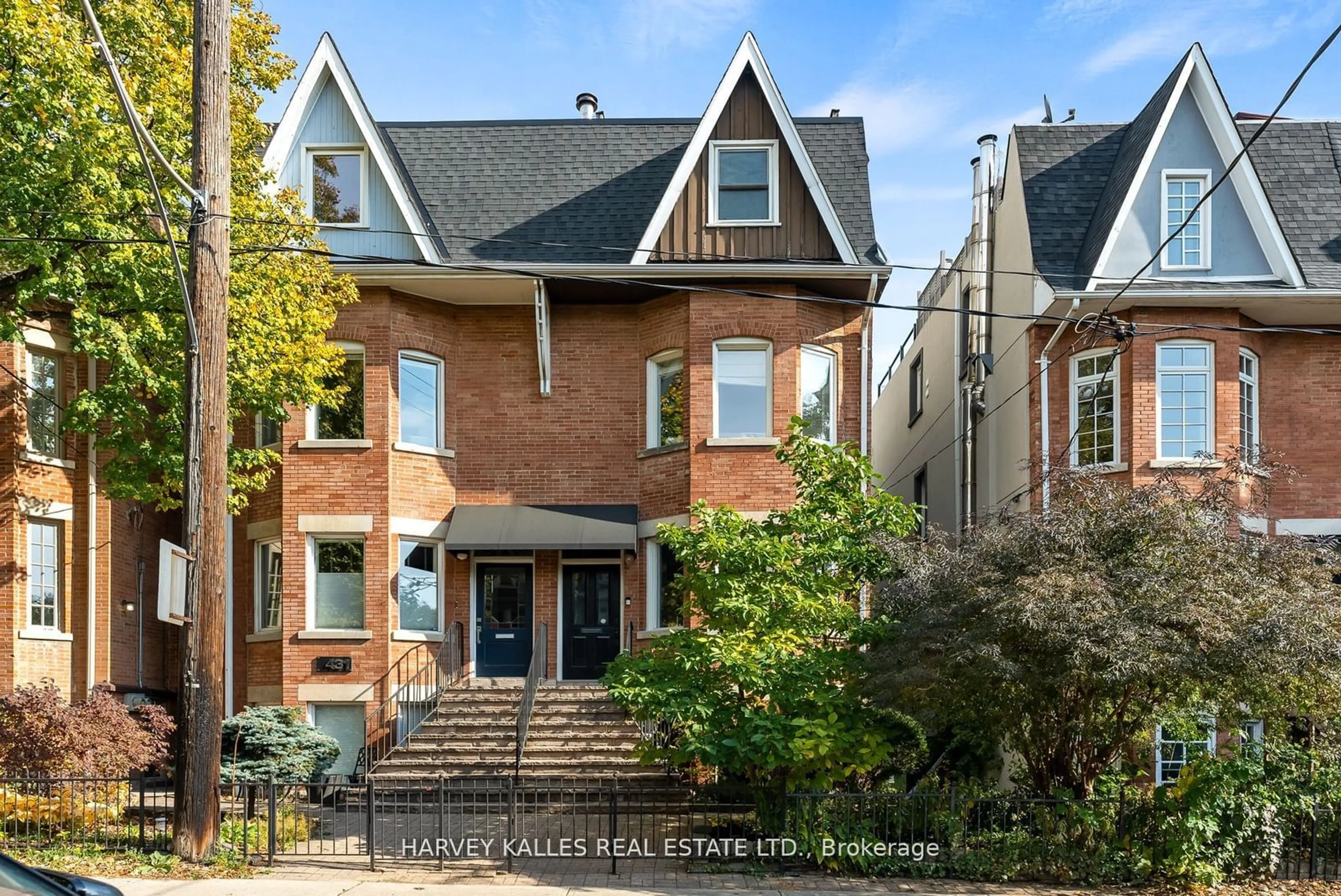 Home with brick exterior material, street for 429 Sackville St, Toronto Ontario M4X 1T1