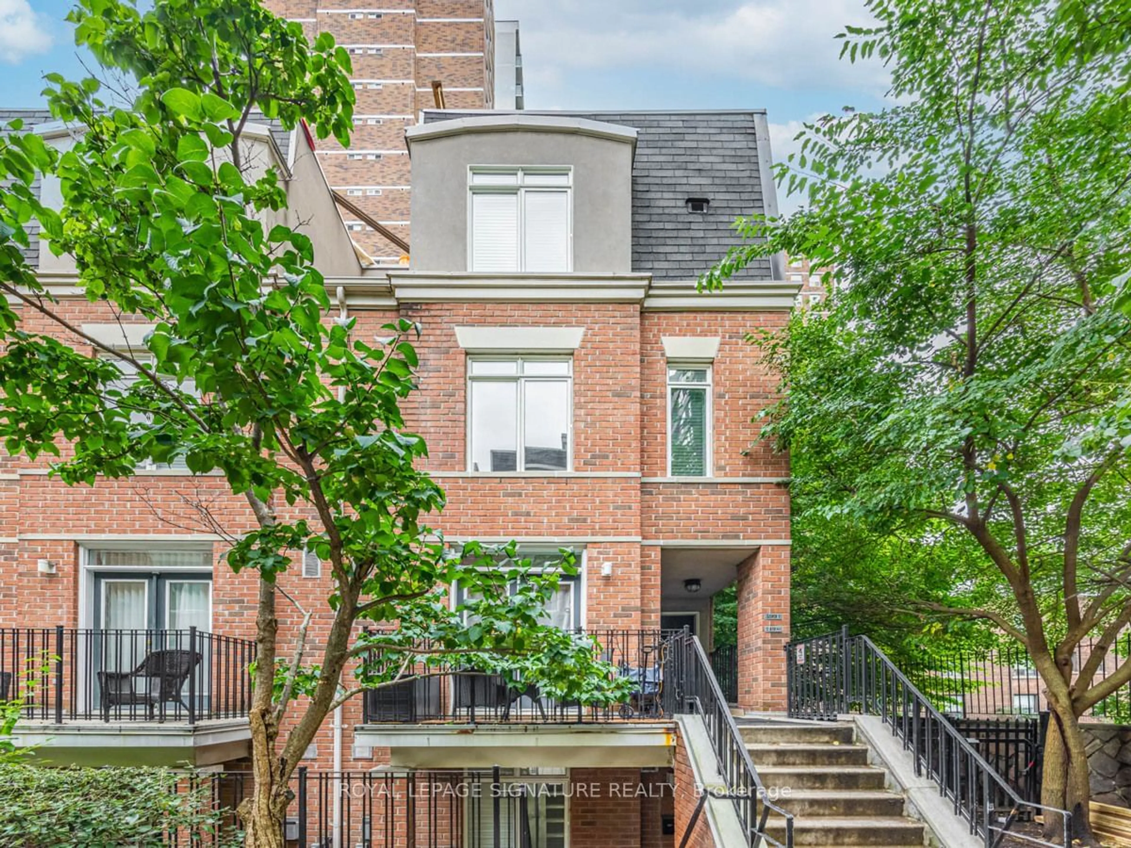 Home with brick exterior material, street for 415 Jarvis St #401, Toronto Ontario M4Y 3C1