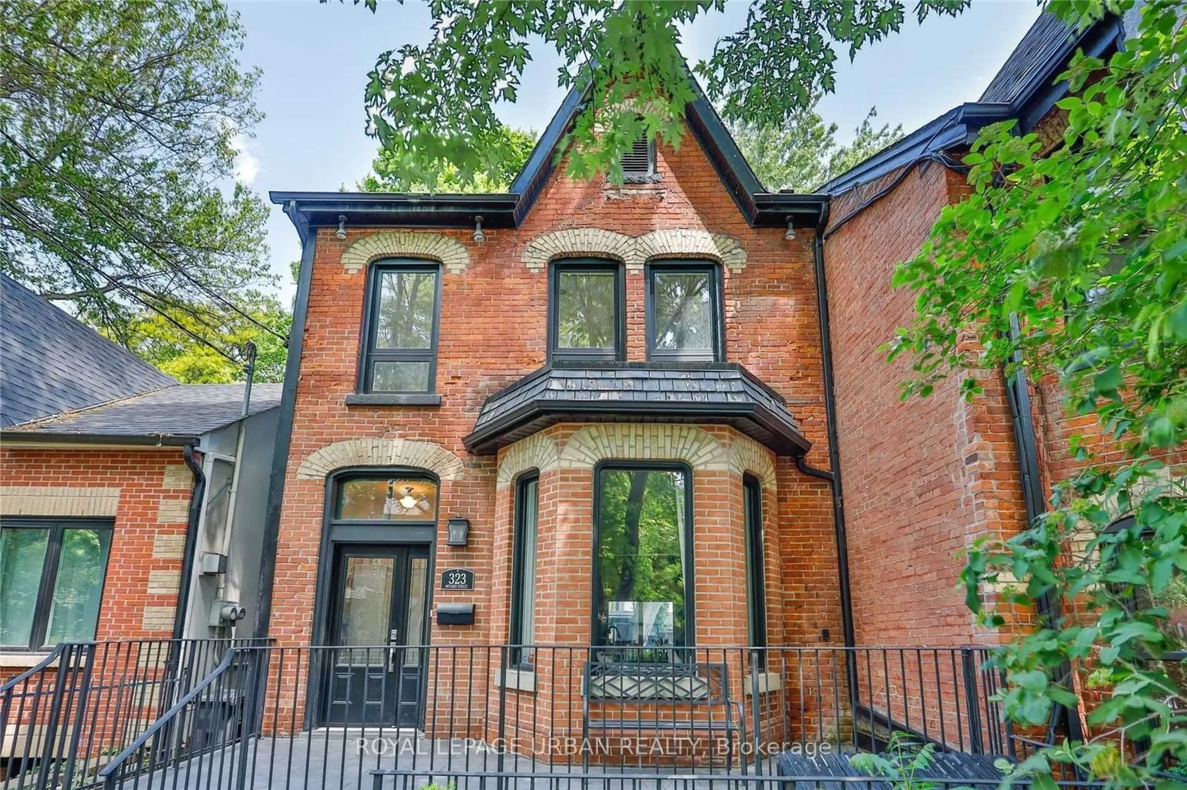 Home with brick exterior material, street for 323 Ontario St, Toronto Ontario M5A 2V8