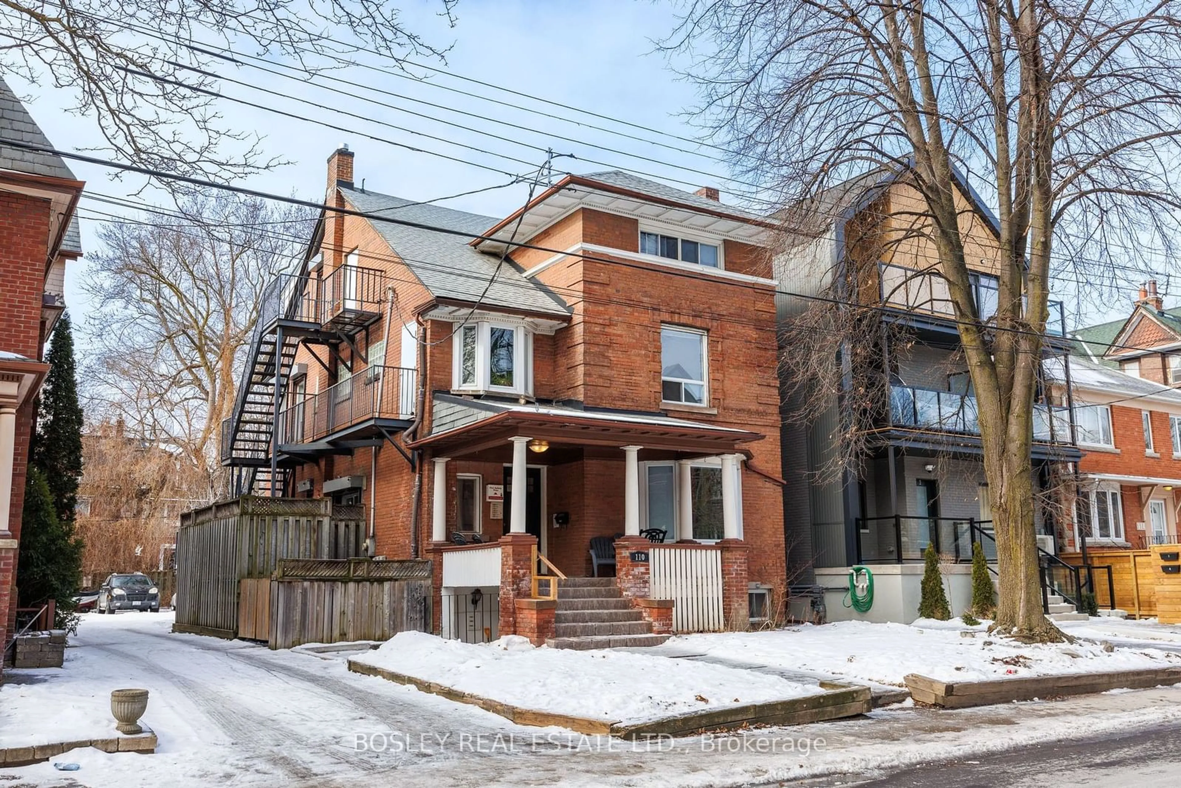 Home with brick exterior material, street for 110 Walmer Rd, Toronto Ontario M5R 2X7