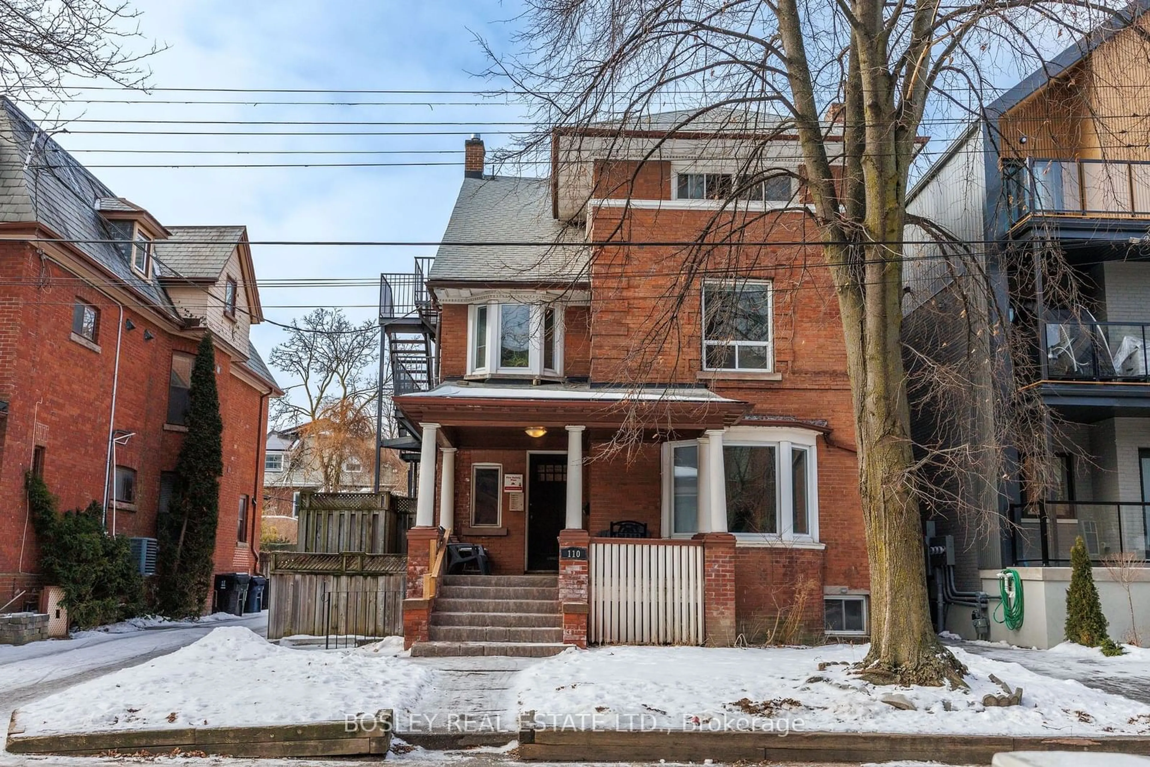 Home with brick exterior material, street for 110 Walmer Rd, Toronto Ontario M5R 2X7