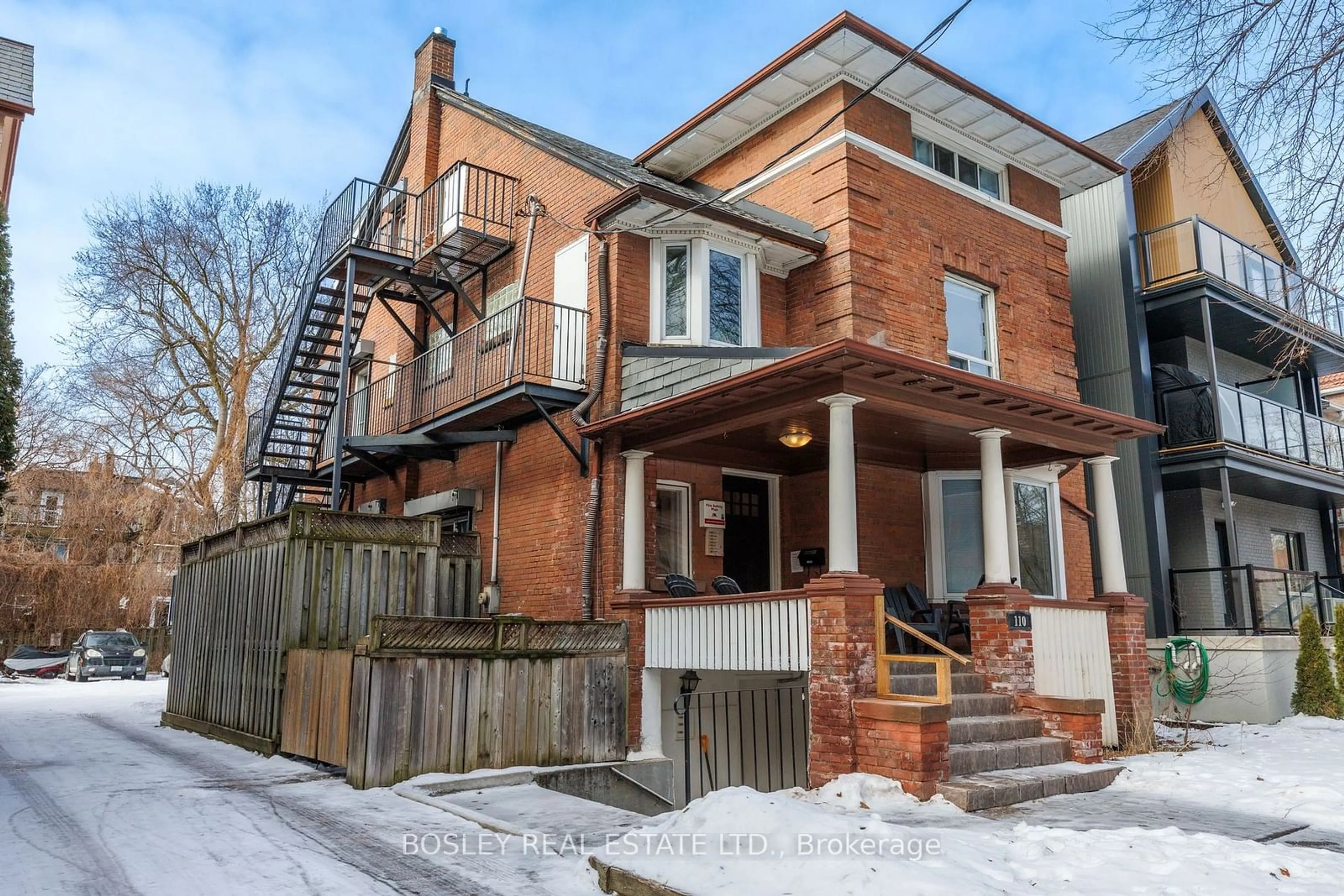 Home with brick exterior material, street for 110 Walmer Rd, Toronto Ontario M5R 2X7