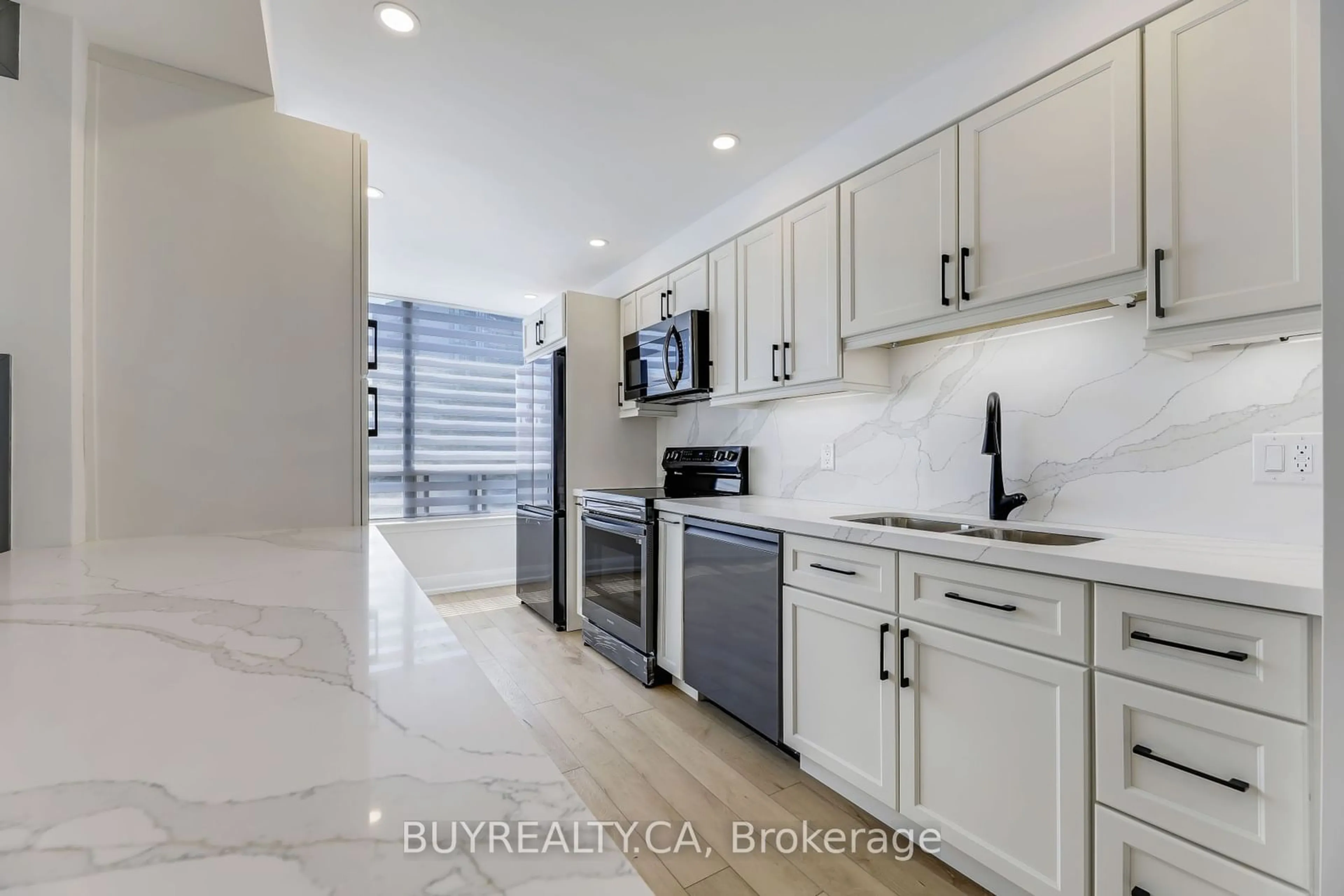 Open concept kitchen, ceramic/tile floor for 1131 Steeles Ave #410, Toronto Ontario M2R 3W8