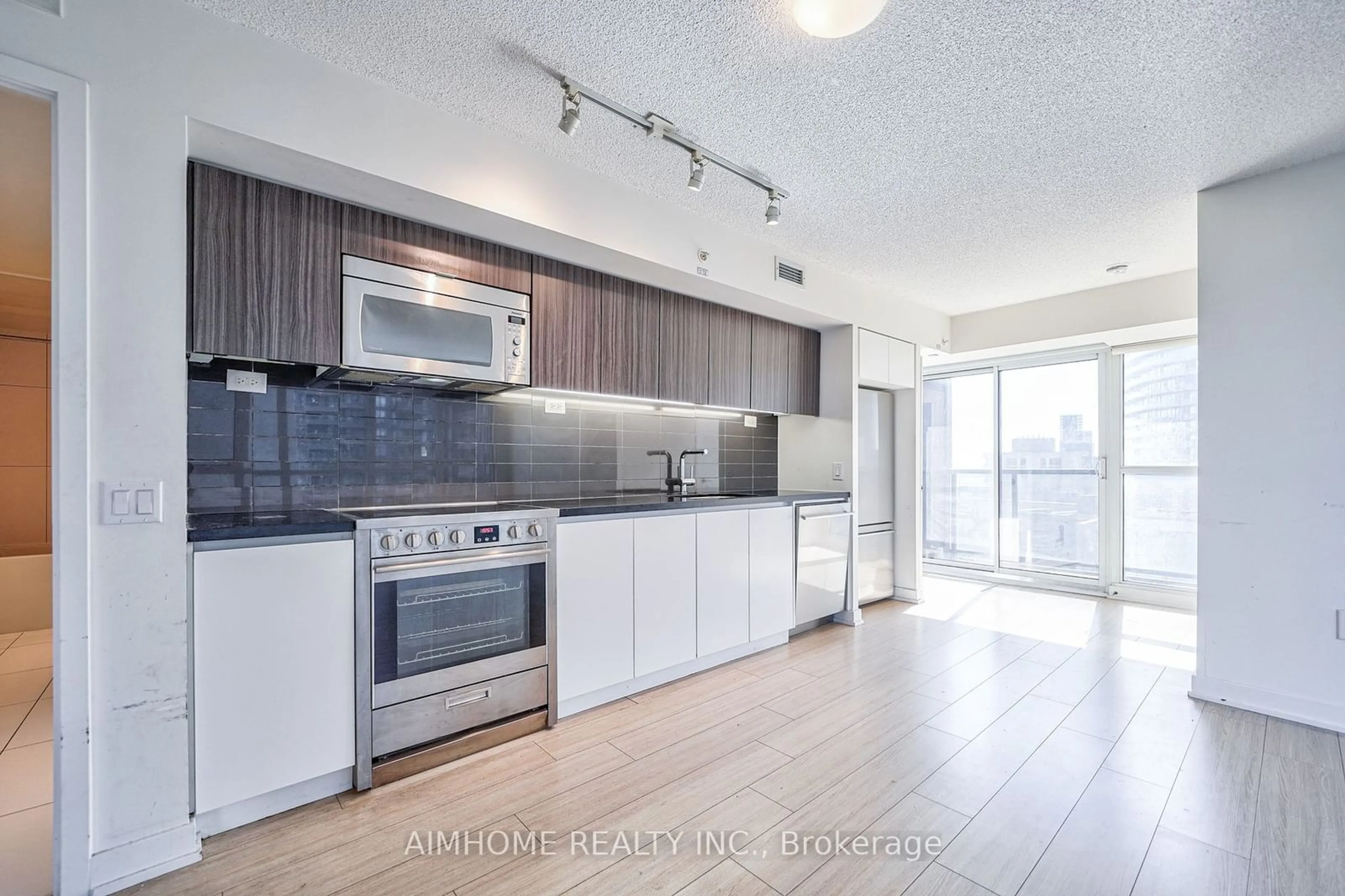 Open concept kitchen, unknown for 85 Queens Wharf Rd #906, Toronto Ontario M5V 0J9