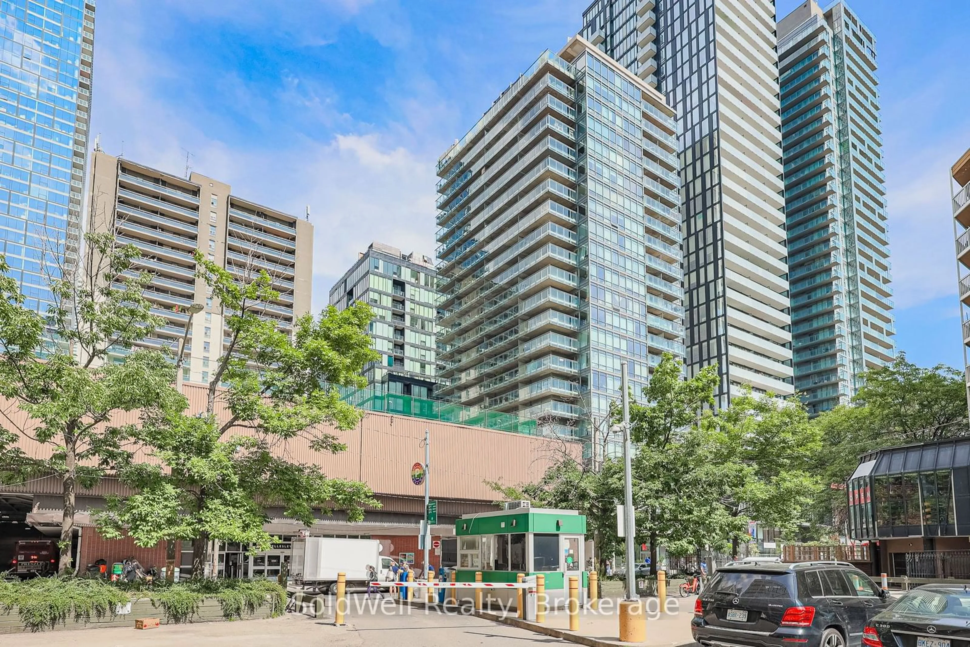 Patio, city buildings view from balcony for 22 Wellesley St #2101, Toronto Ontario M4Y 1G3