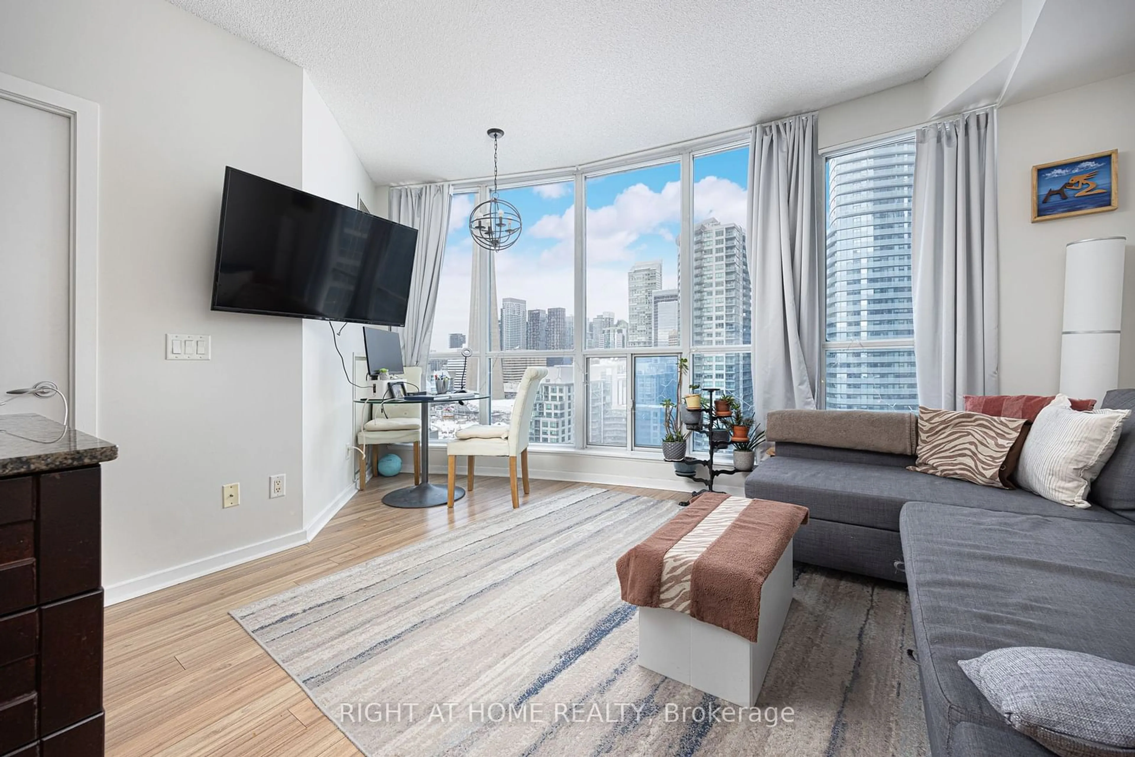 Living room with furniture, wood/laminate floor for 208 Queens Quay #2113, Toronto Ontario M5J 1A7