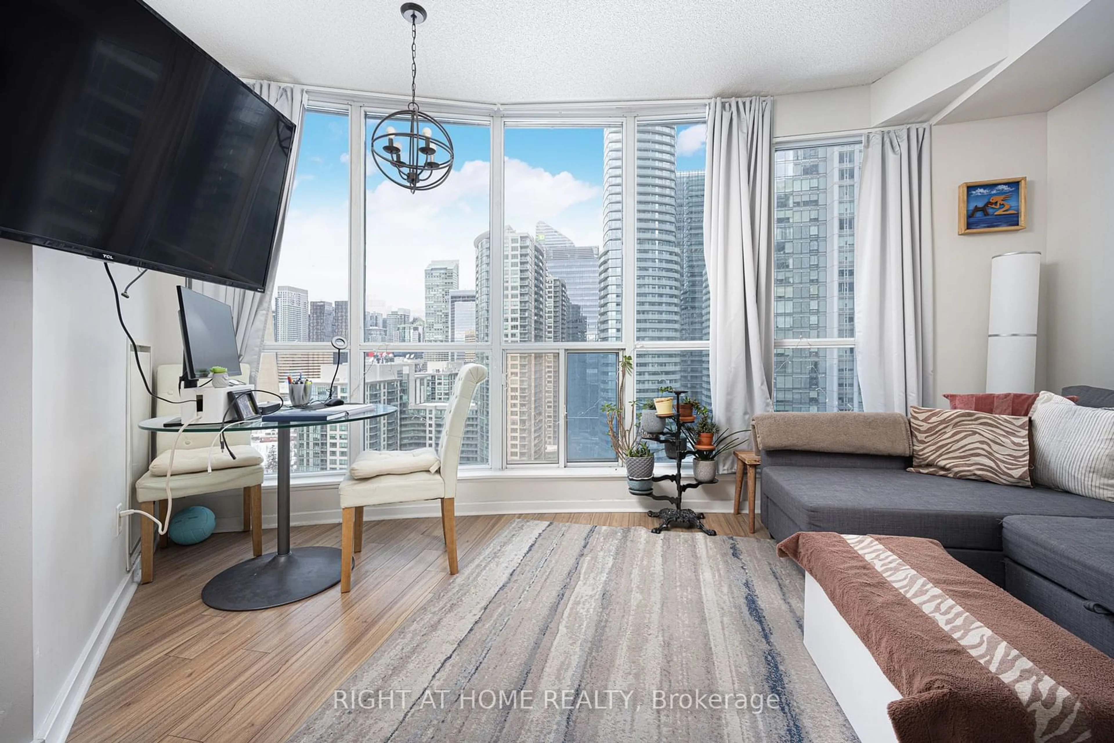 Living room with furniture, wood/laminate floor for 208 Queens Quay #2113, Toronto Ontario M5J 1A7