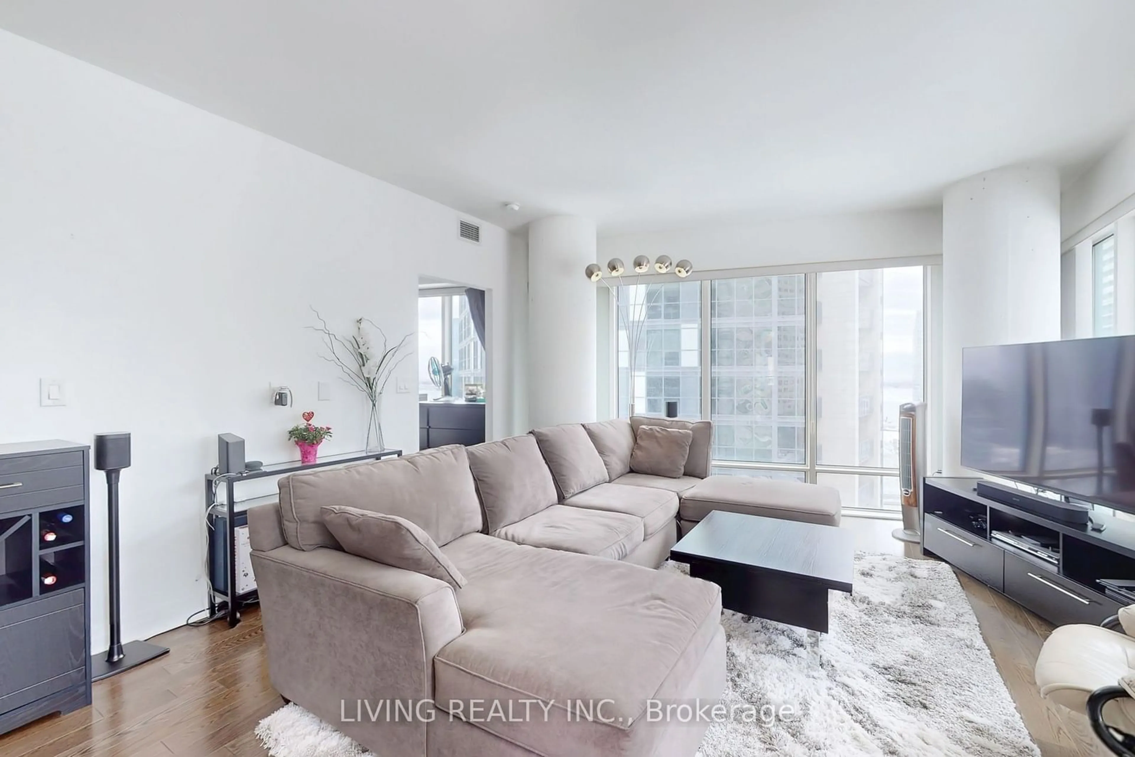 Living room with furniture, unknown for 8 The Esplanade St #1802, Toronto Ontario M5E 0A6