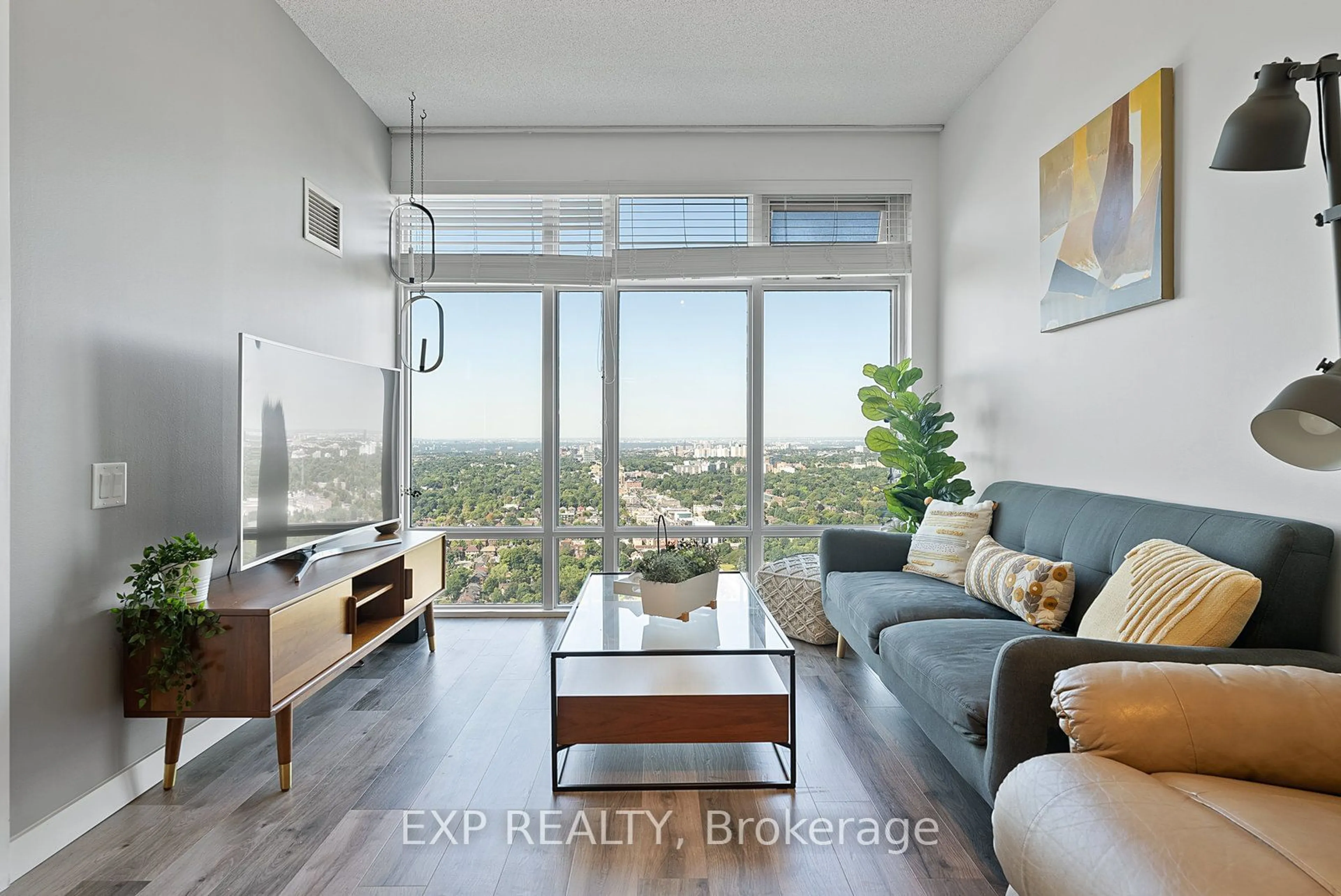 Living room with furniture, wood/laminate floor for 2191 Yonge St #4606, Toronto Ontario M4S 3H8