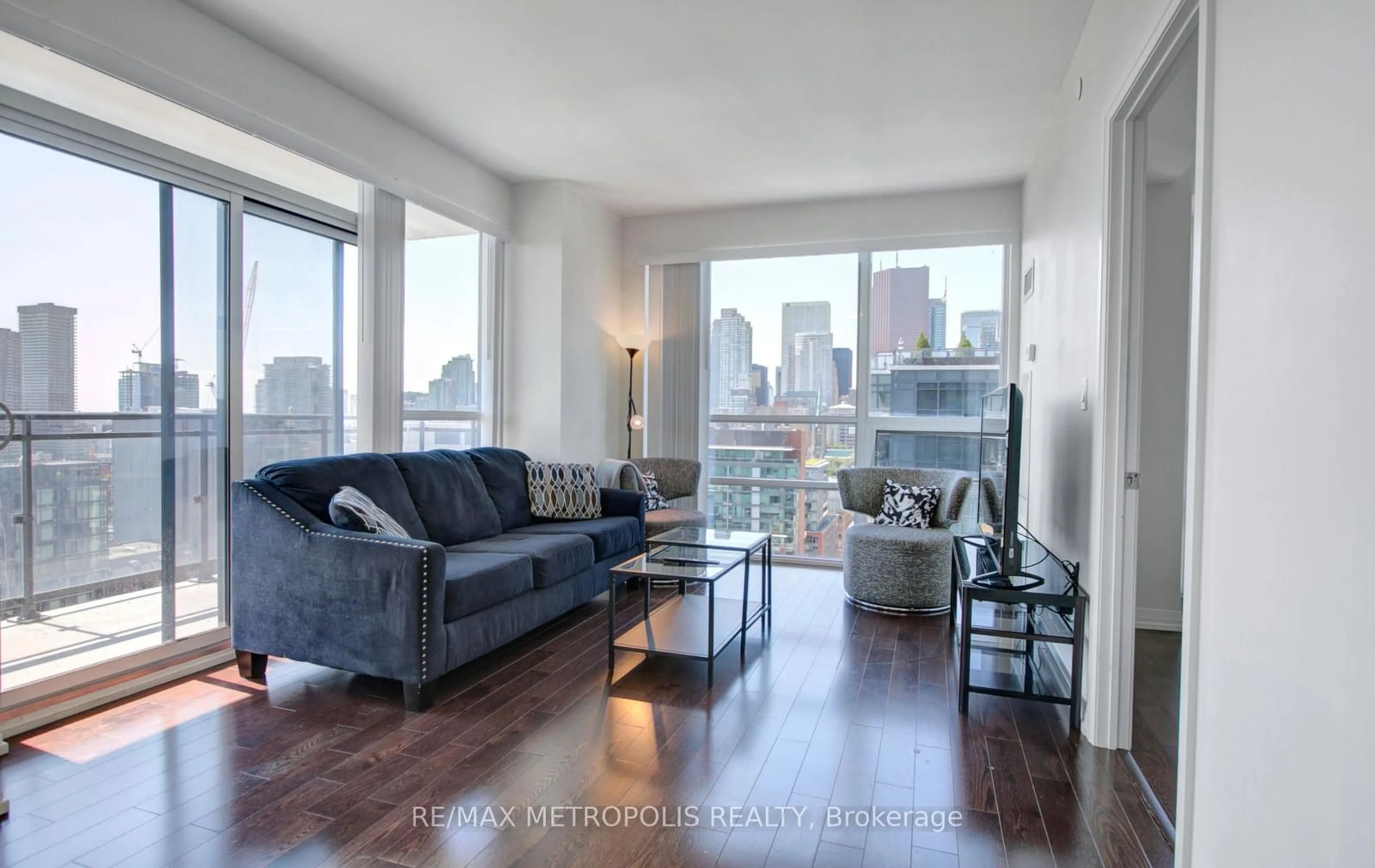 Living room with furniture, wood/laminate floor for 460 Adelaide St #2015, Toronto Ontario M5A 0E7