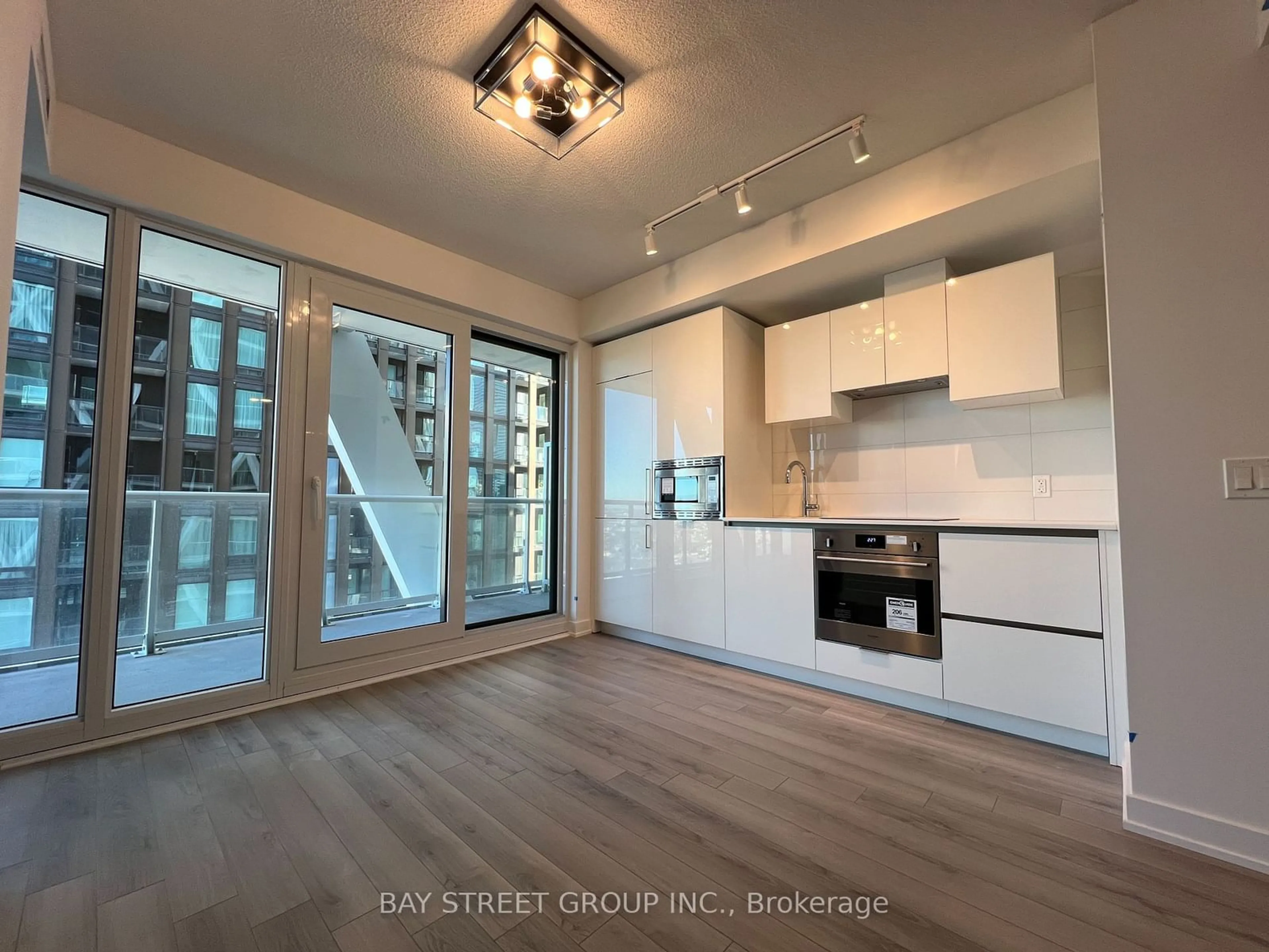 Open concept kitchen, unknown for 230 Simcoe St #2320, Toronto Ontario M5T 0G7