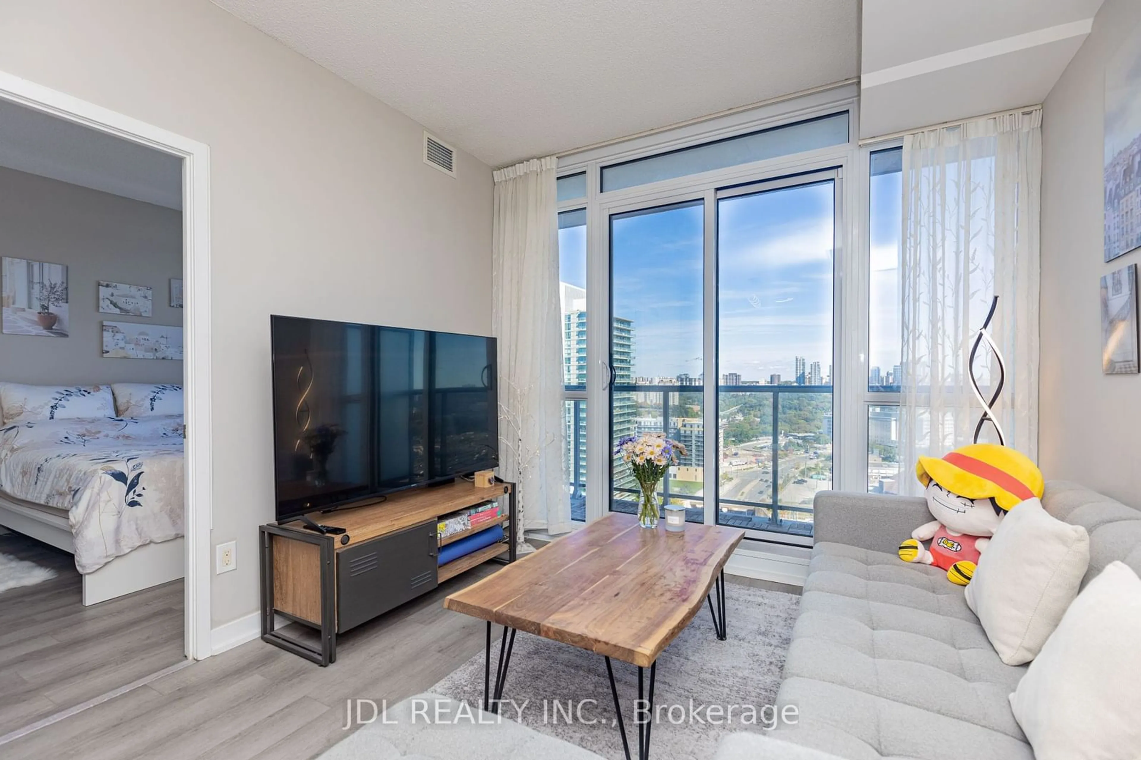 Living room with furniture, wood/laminate floor for 121 Mcmahon Dr #2302, Toronto Ontario M2K 0C1