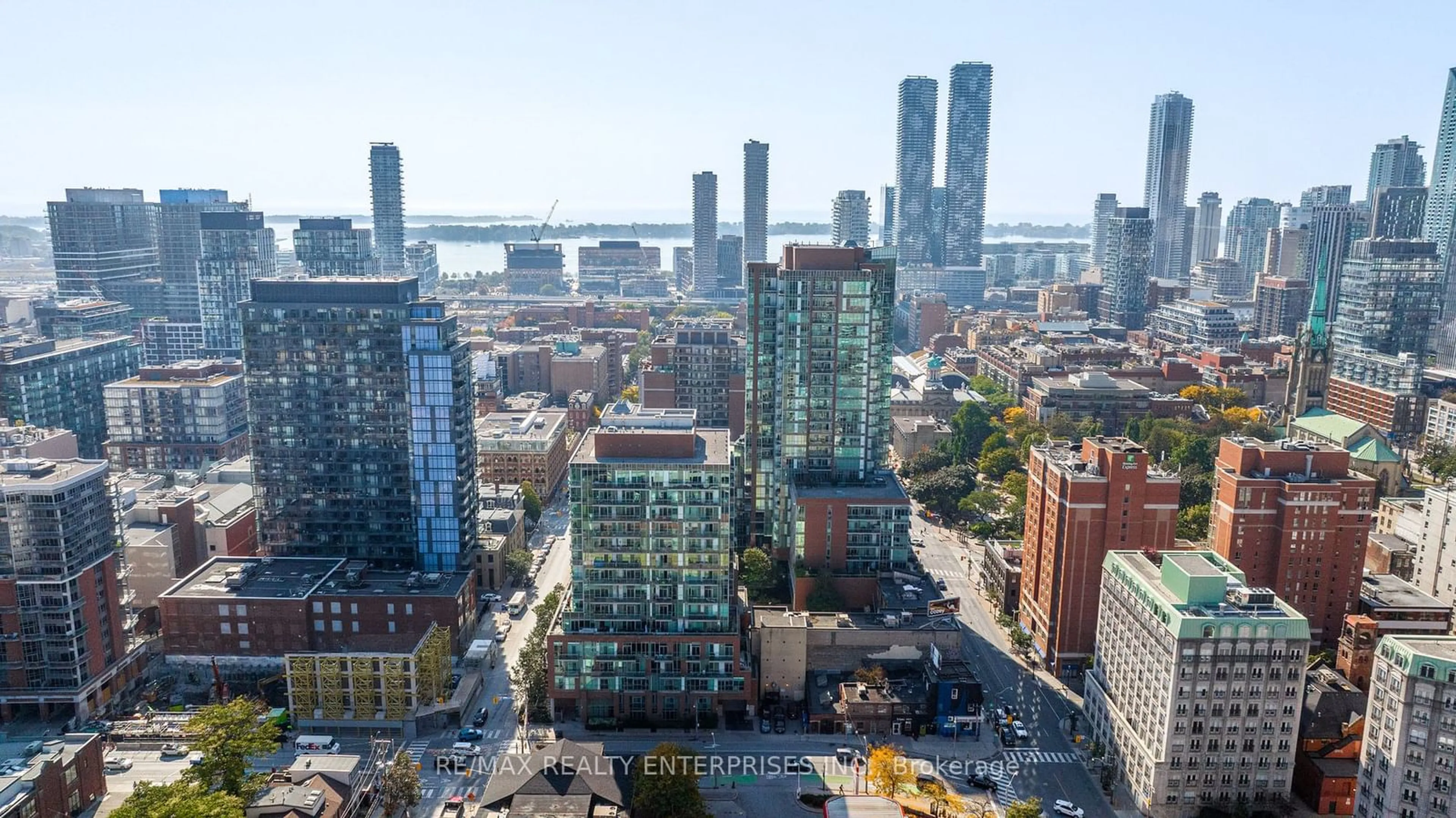 A pic from outside/outdoor area/front of a property/back of a property/a pic from drone, city buildings view from balcony for 112 George St #902, Toronto Ontario M5A 2M5