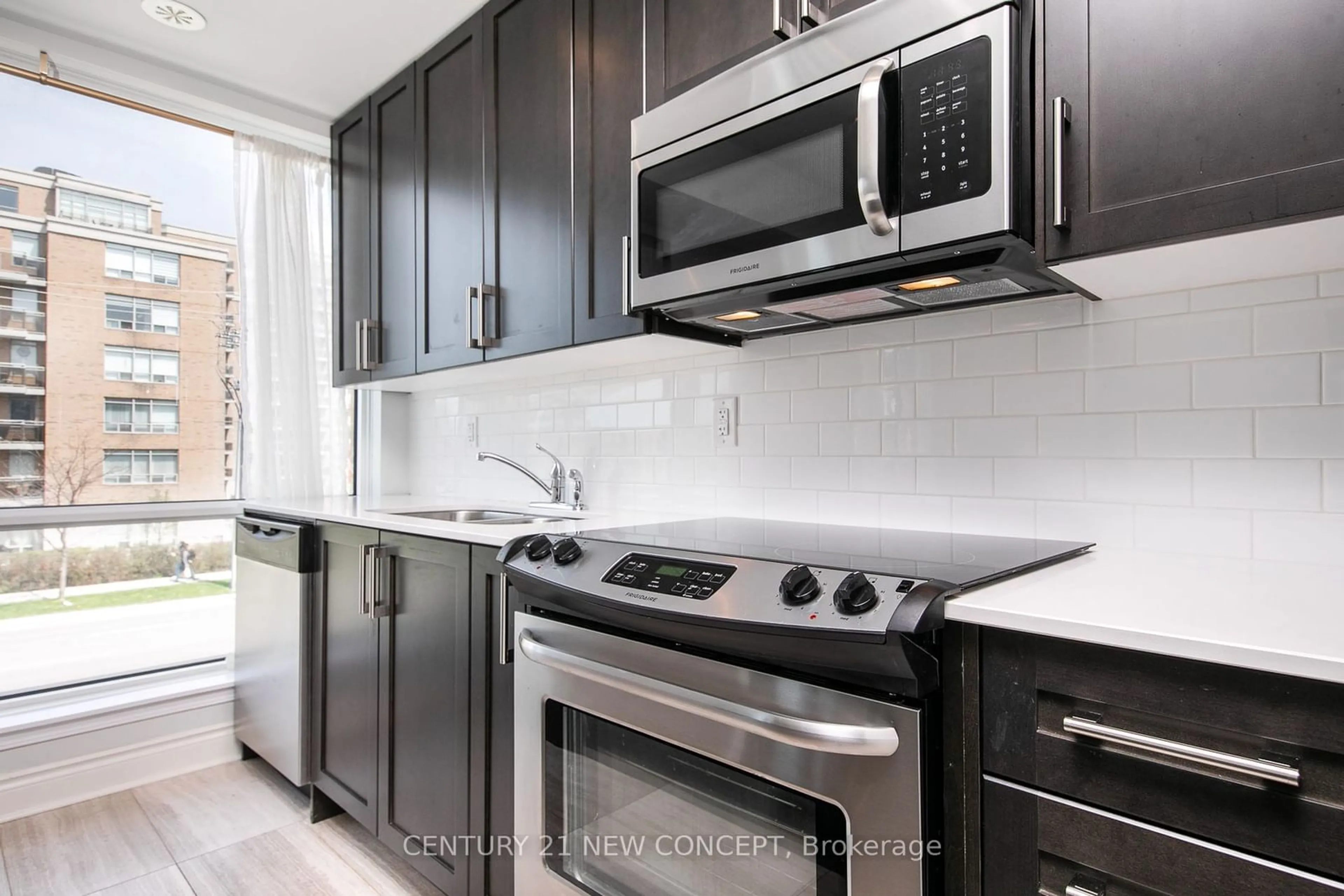 Standard kitchen, ceramic/tile floor for 639 Lawrence Ave #320, Toronto Ontario M6A 1A9